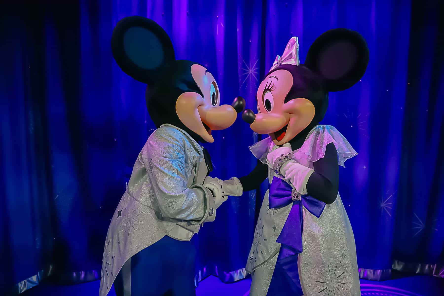 Mickey and Minnie sharing a moment. 