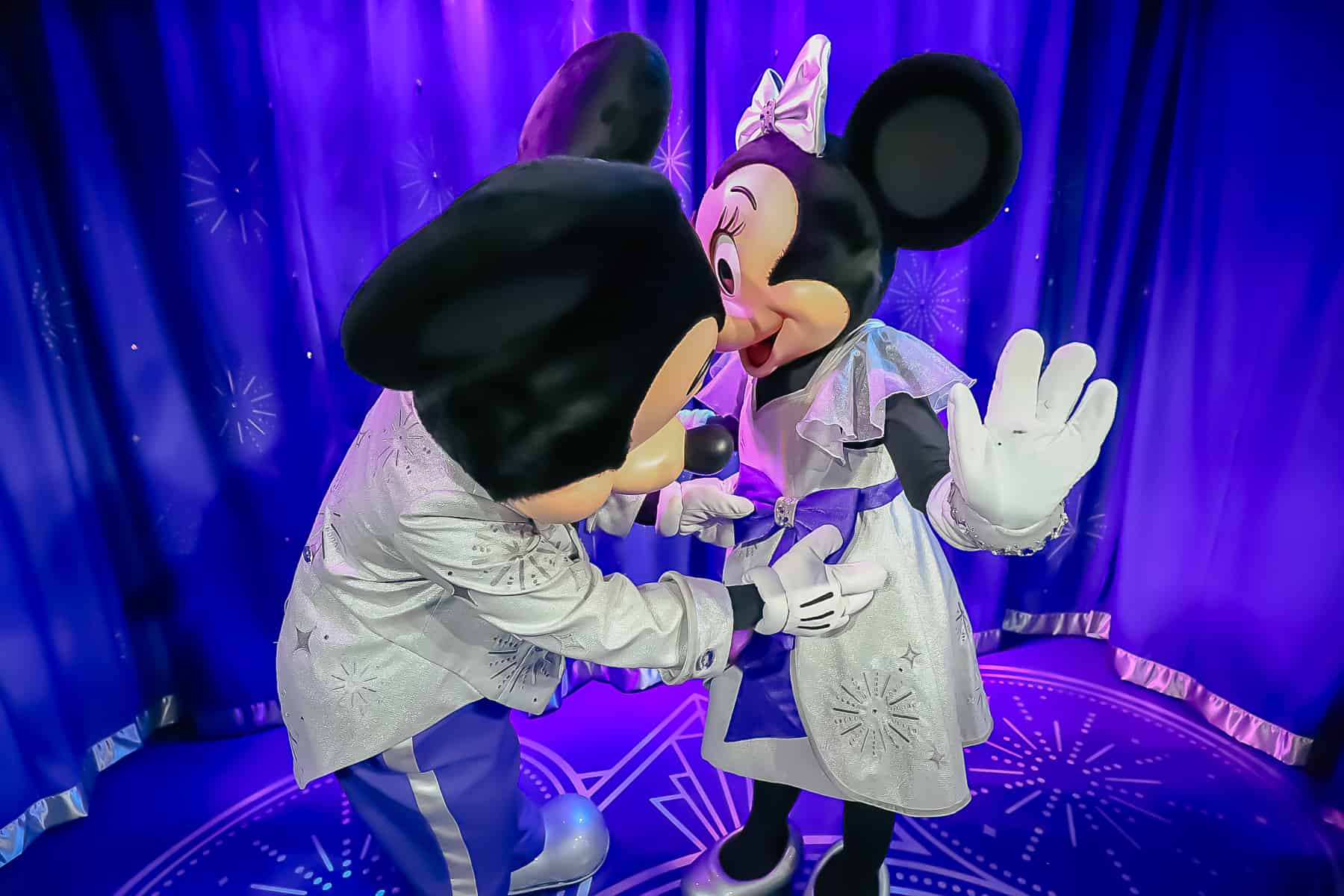 Mickey adjusting Minnie's Bow 