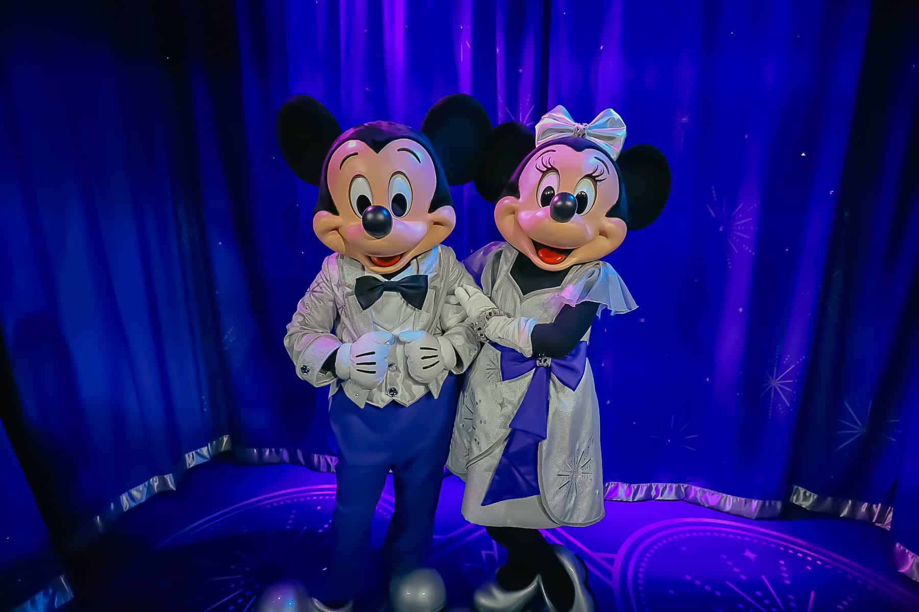 Mickey and Minnie Mouse in Disney100 attire 