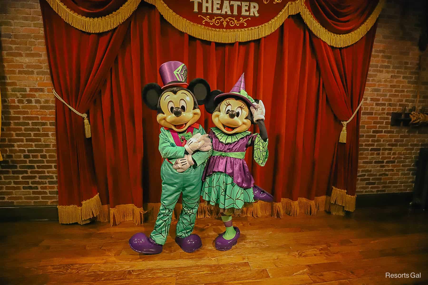 Mickey and Minnie Mouse pose for a photo together during Mickey's Not So Scary Halloween Party in 2025 