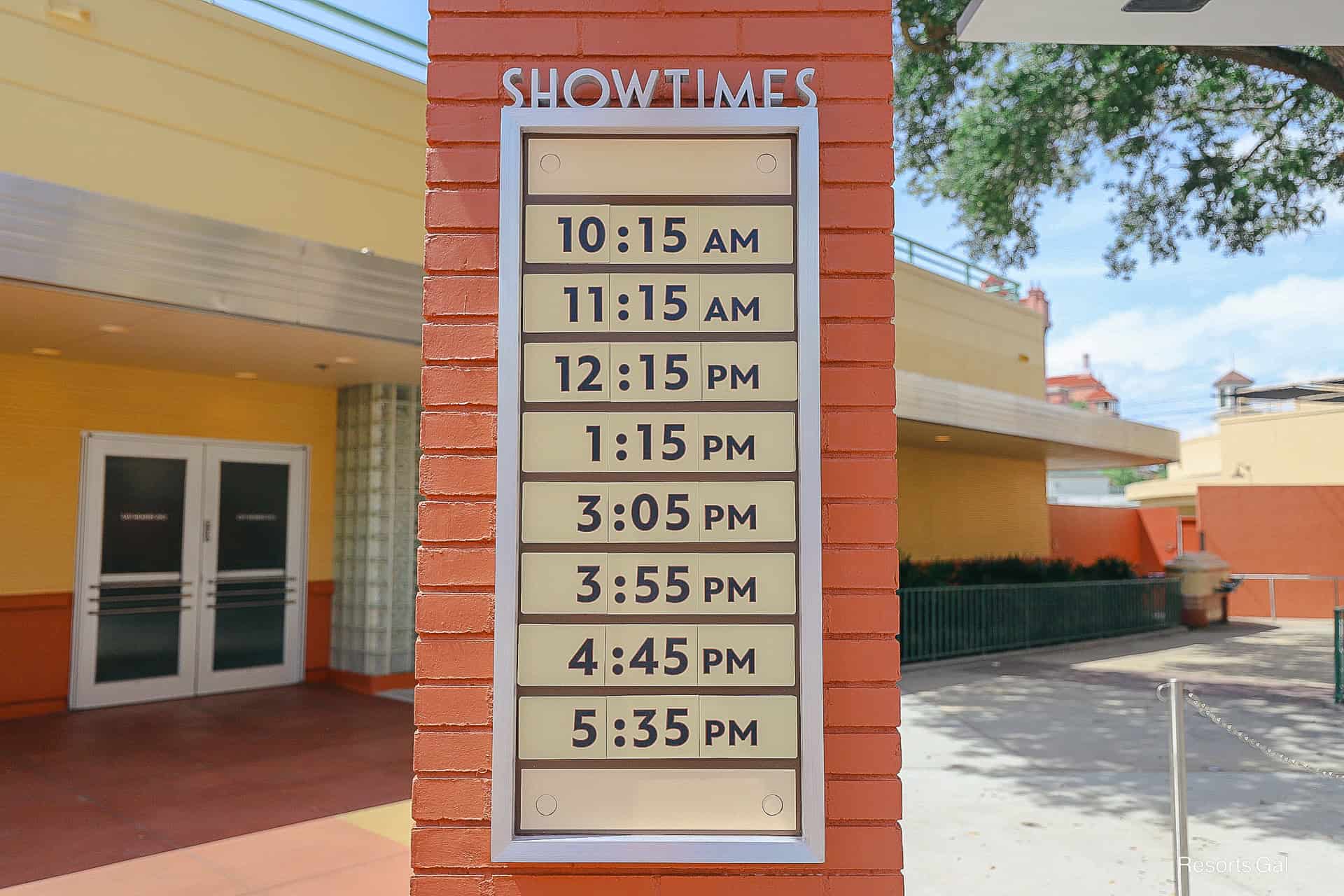 a sign with showtimes for Mickey Mouse Clubhouse Live! 