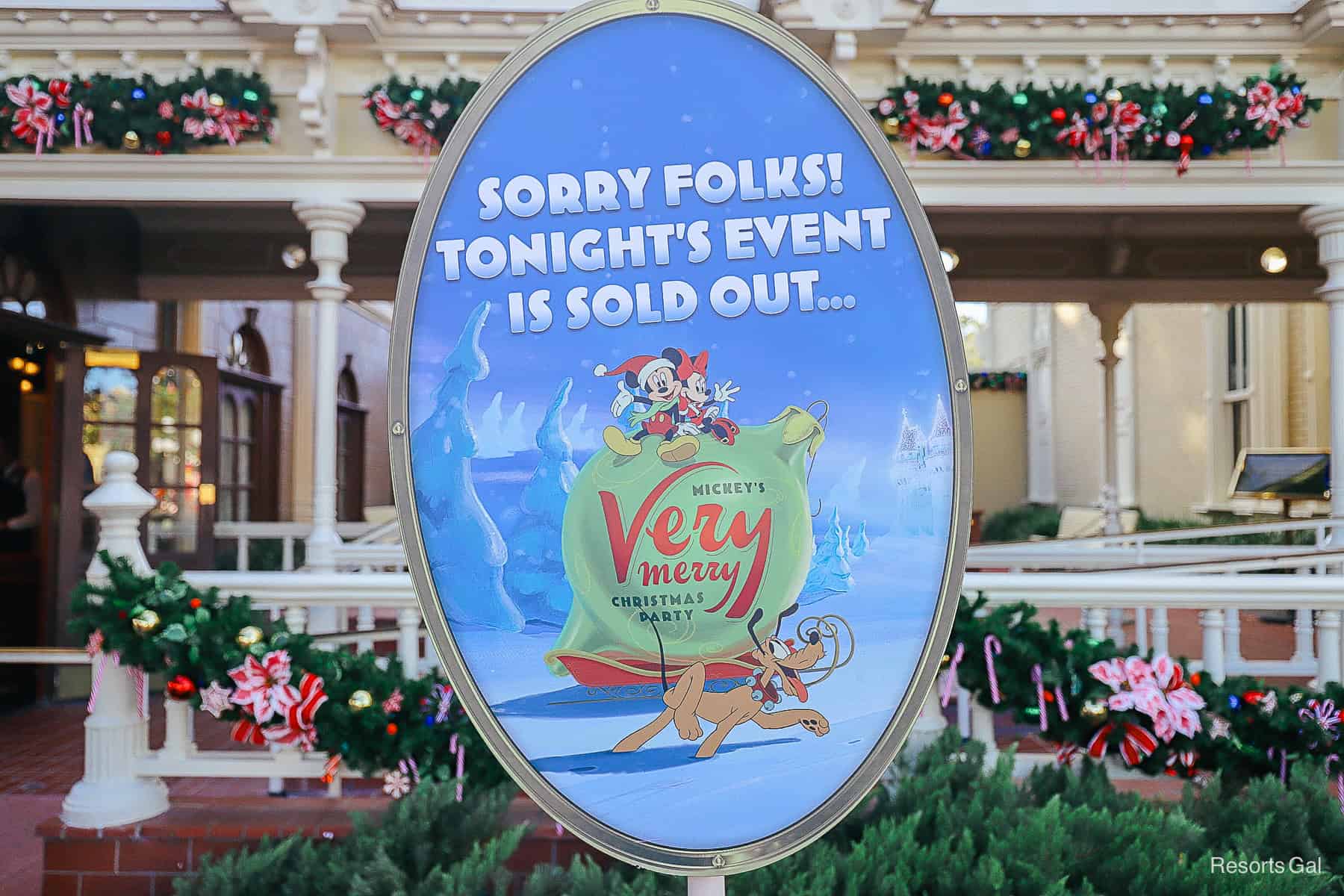 a sign that reads, "Sorry Folks Tonights Event is Sold Out...Mickey's Very Merry Christmas Party"