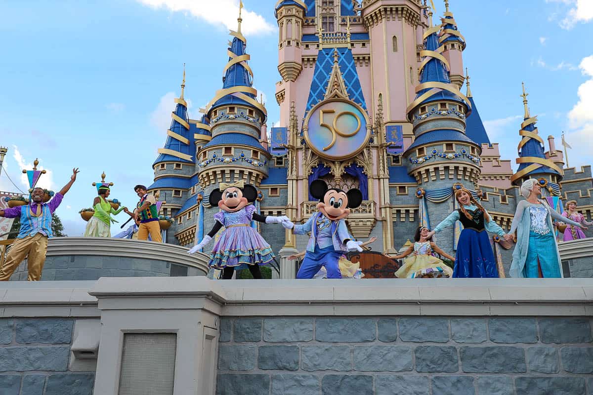 Characters dancing on stage during Mickey's Magical Friendship Faire.