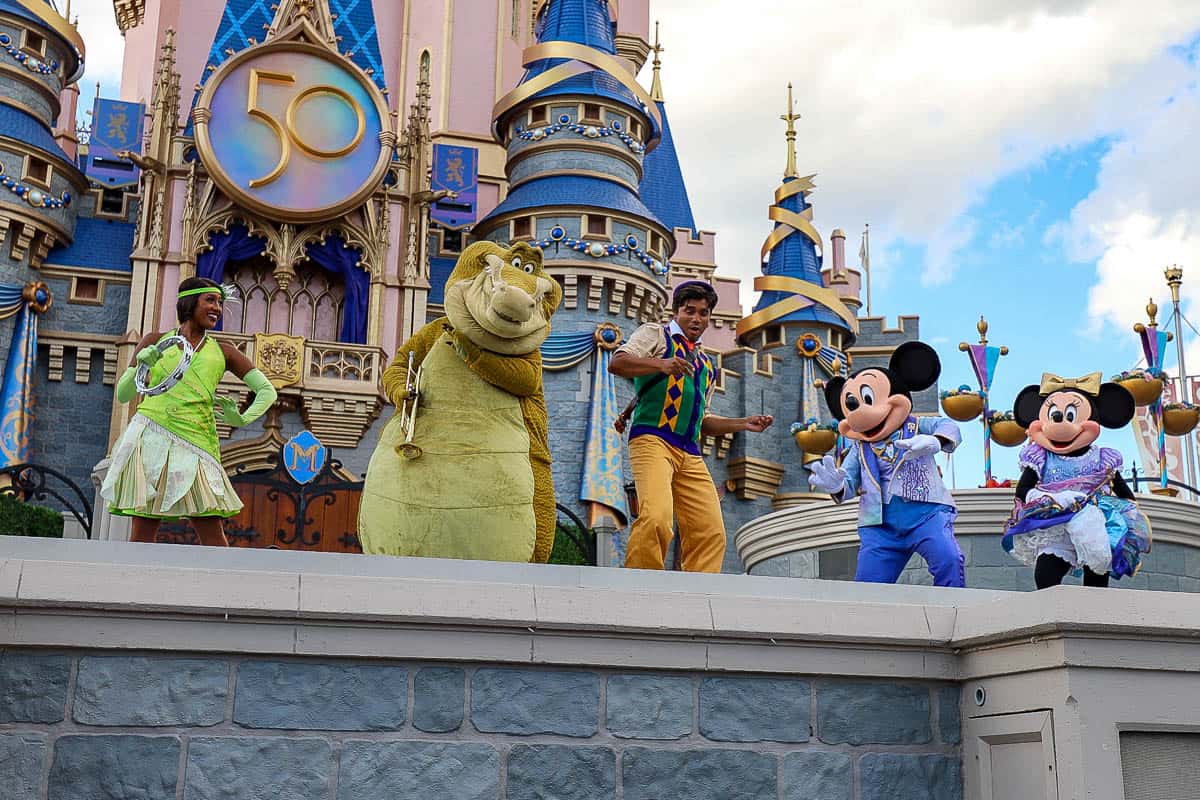 Princess Tiana, Louis, Prince Naveen and Mickey and Minnie Mouse 