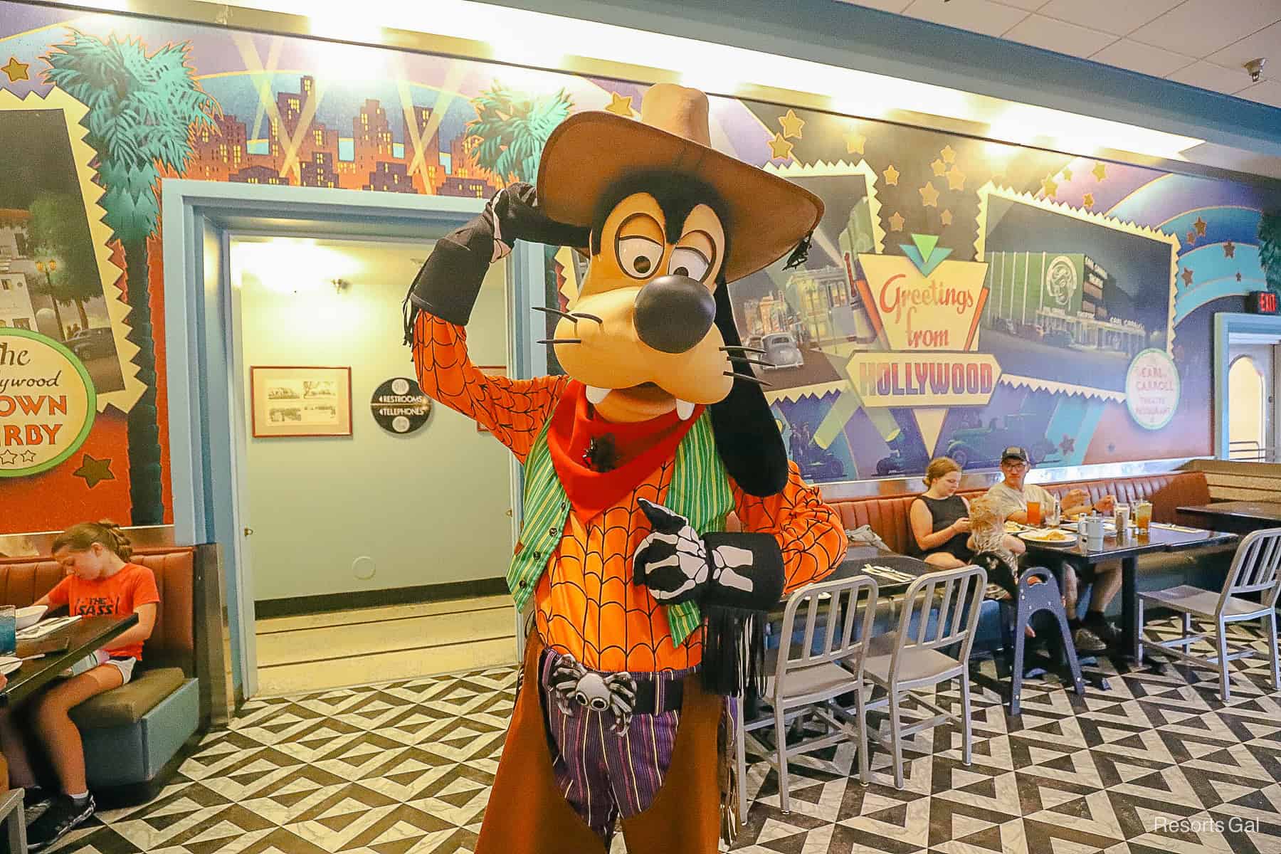 Goofy poses for a photo. 