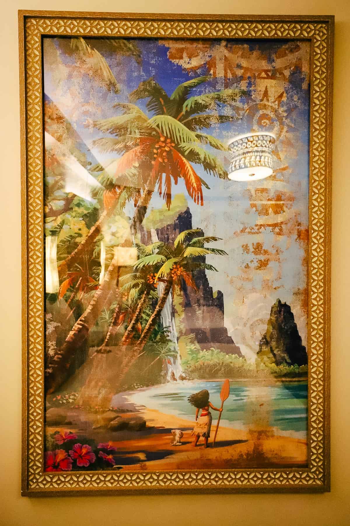 Moana artwork hangs on the wall. 