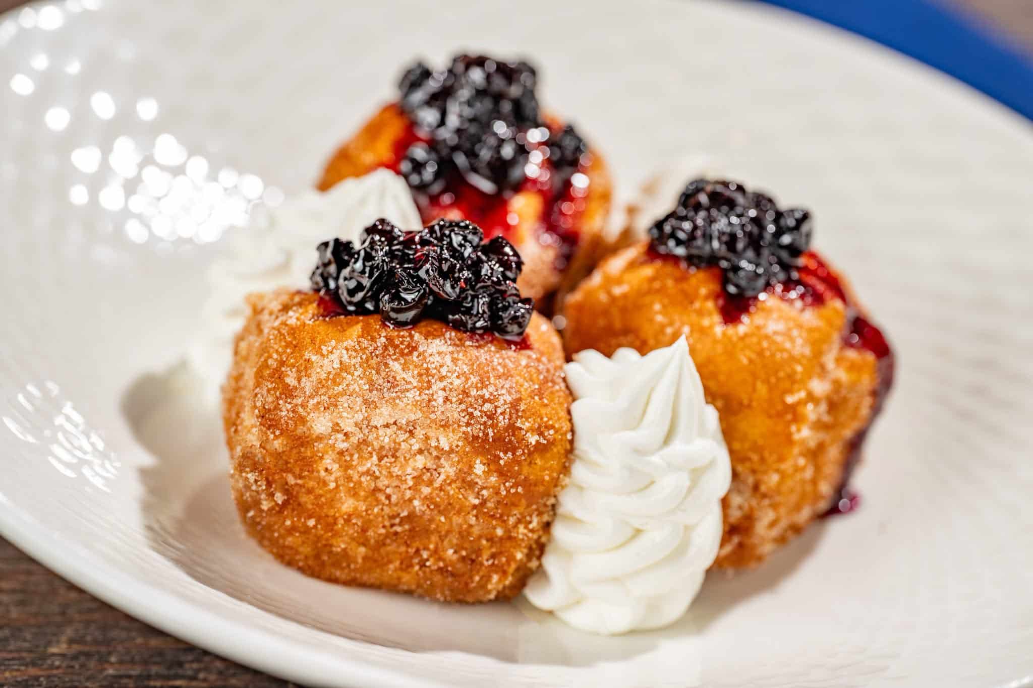 an order of stuffed French Toast with dream and berry topping
