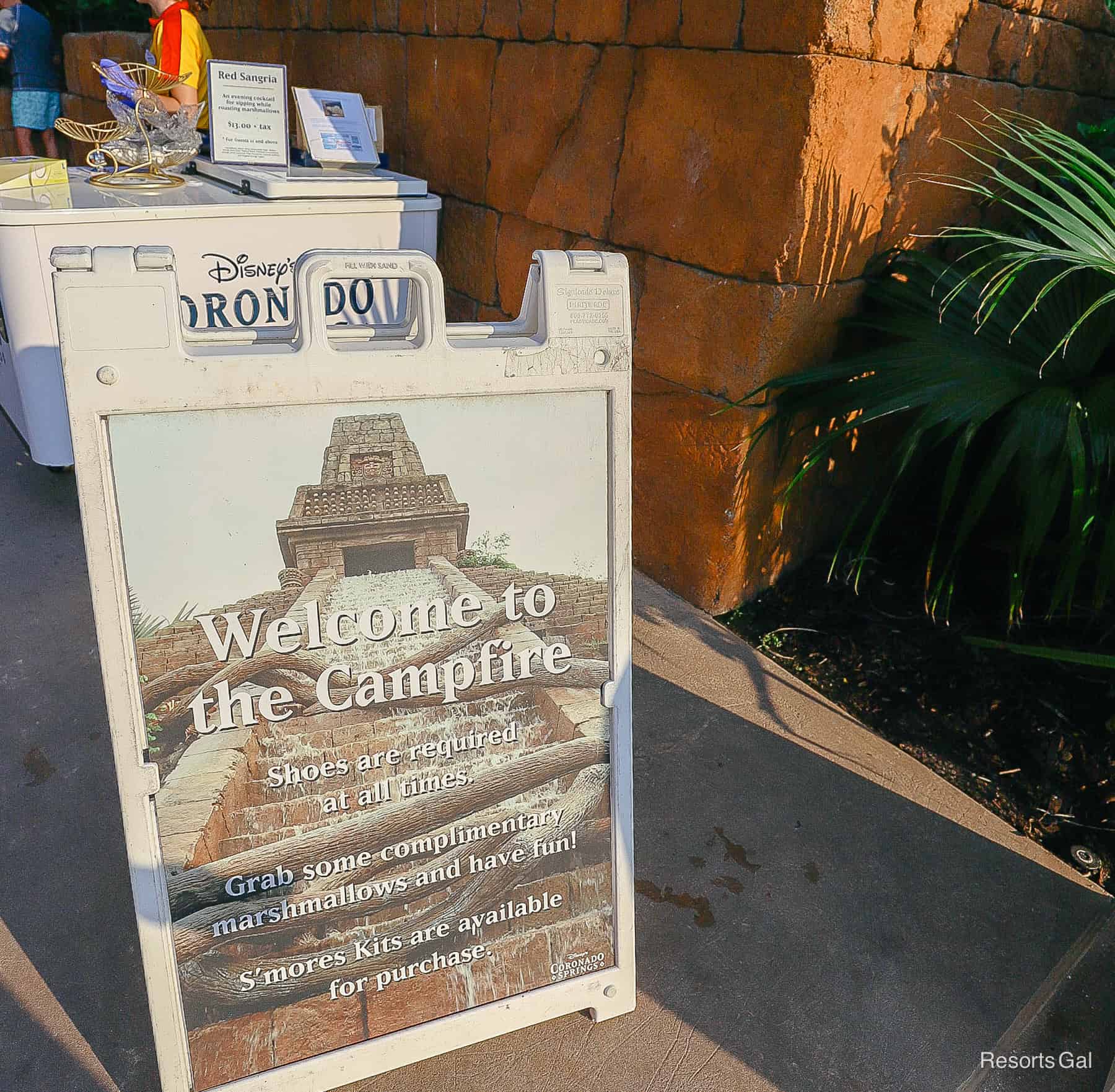 a sign that welcomes guests to the campfire