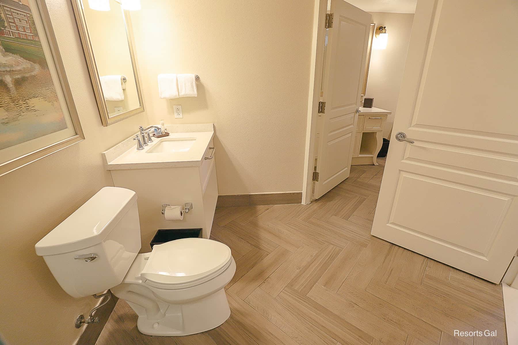 shows the layout of the split bath with doors 