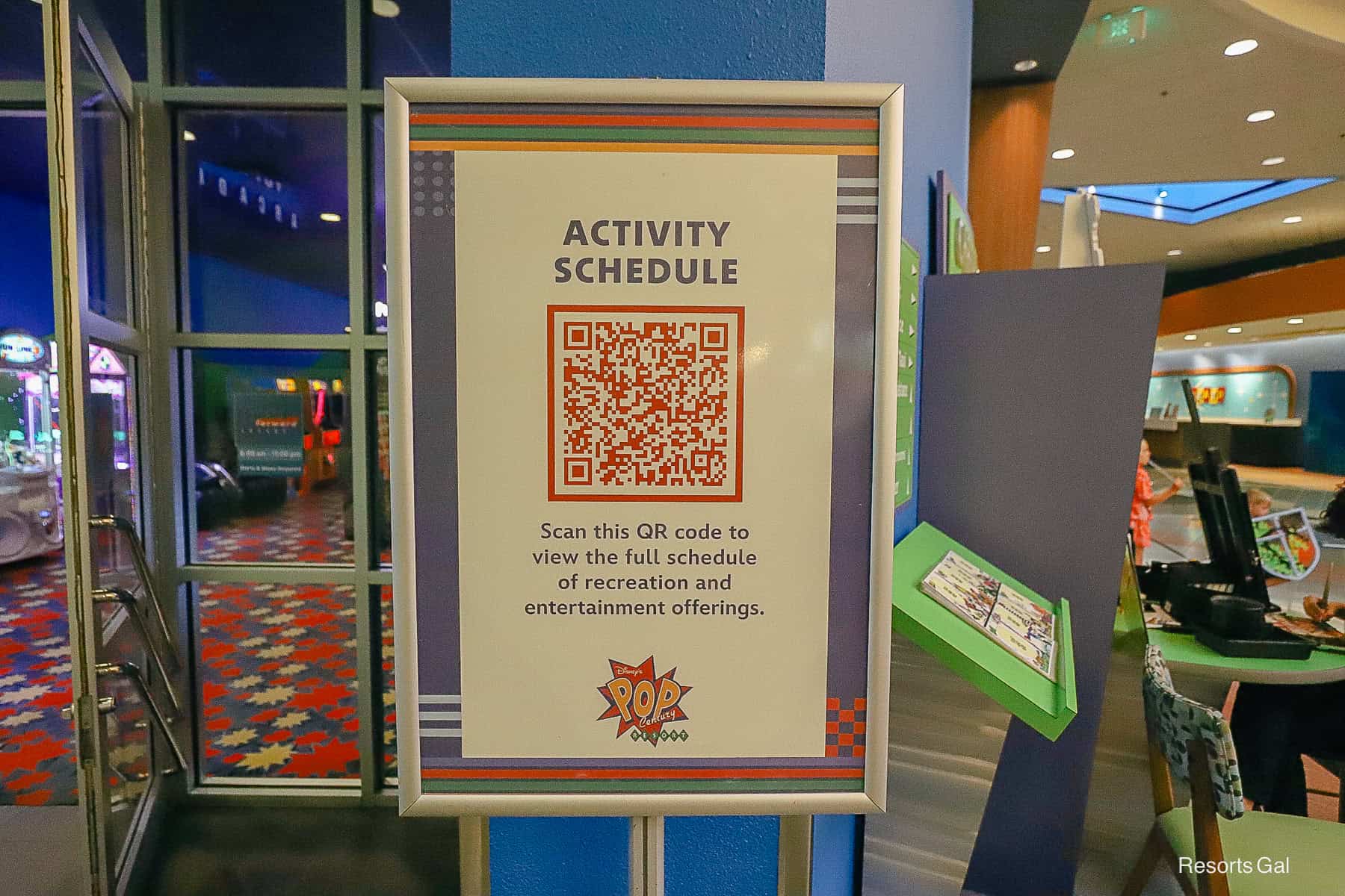 a sign with Pop Century activity schedule