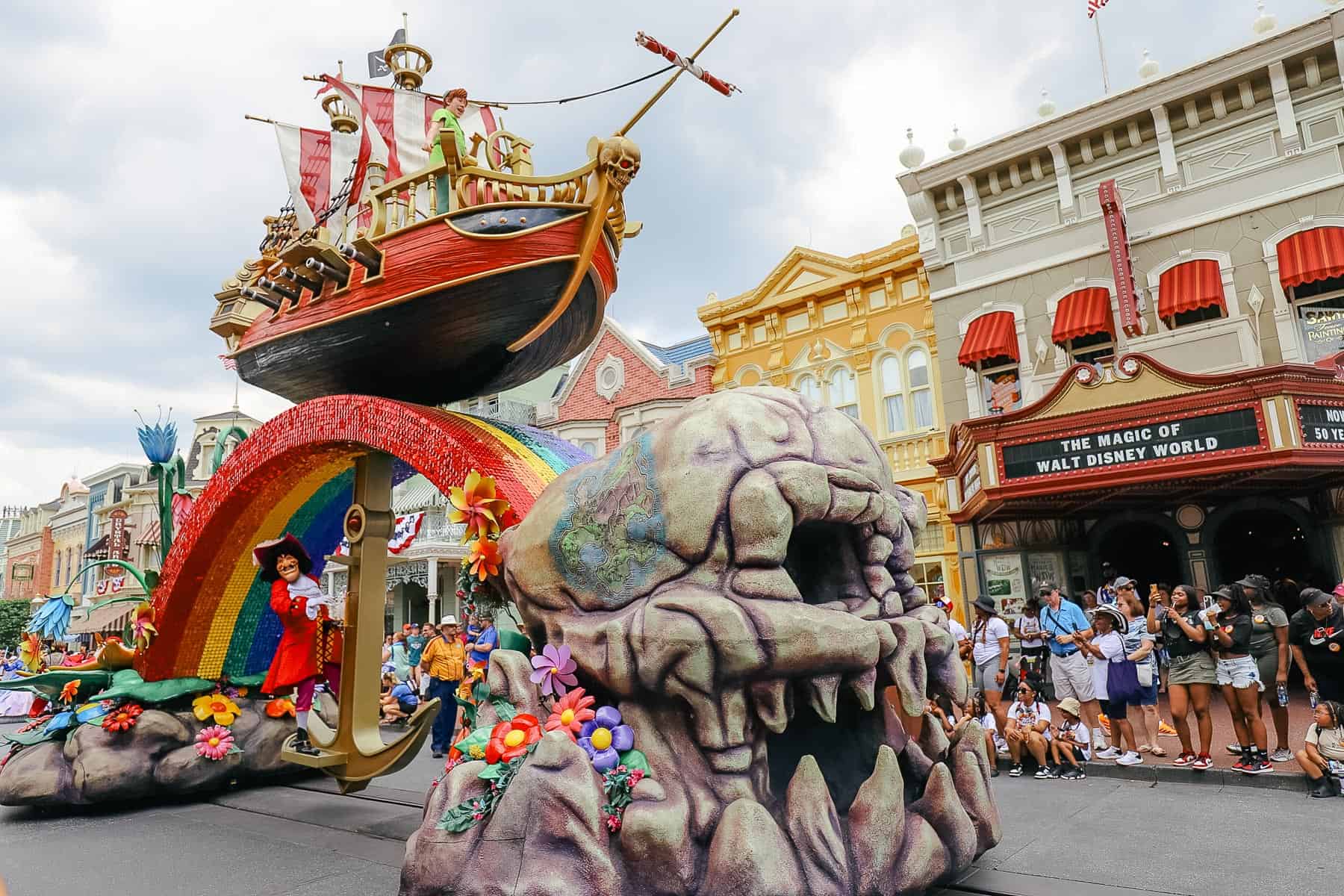 Peter Pan steers Captain Hook's ship down Main Street USA. 