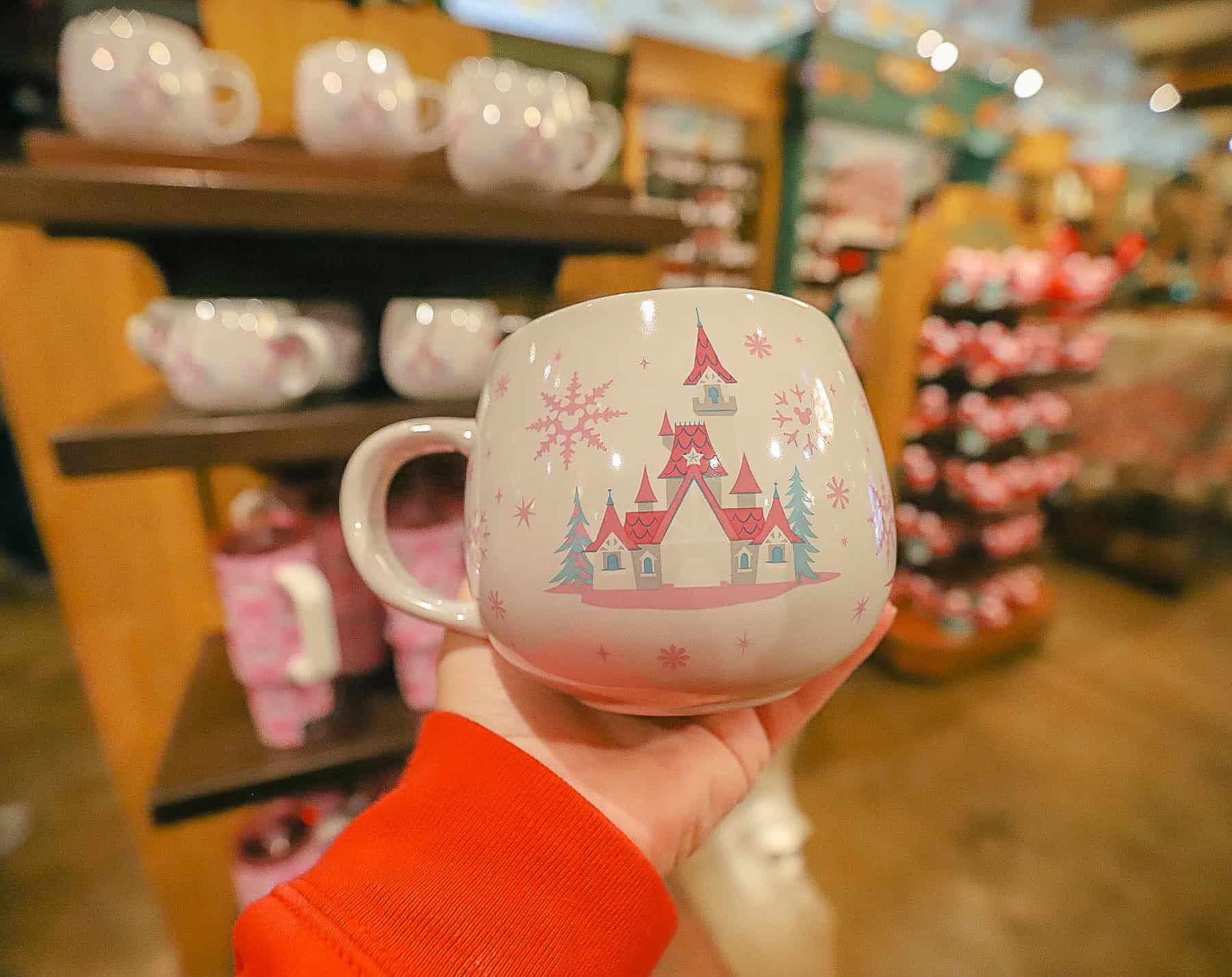 the castle side of the pink bow and snowflake mug
