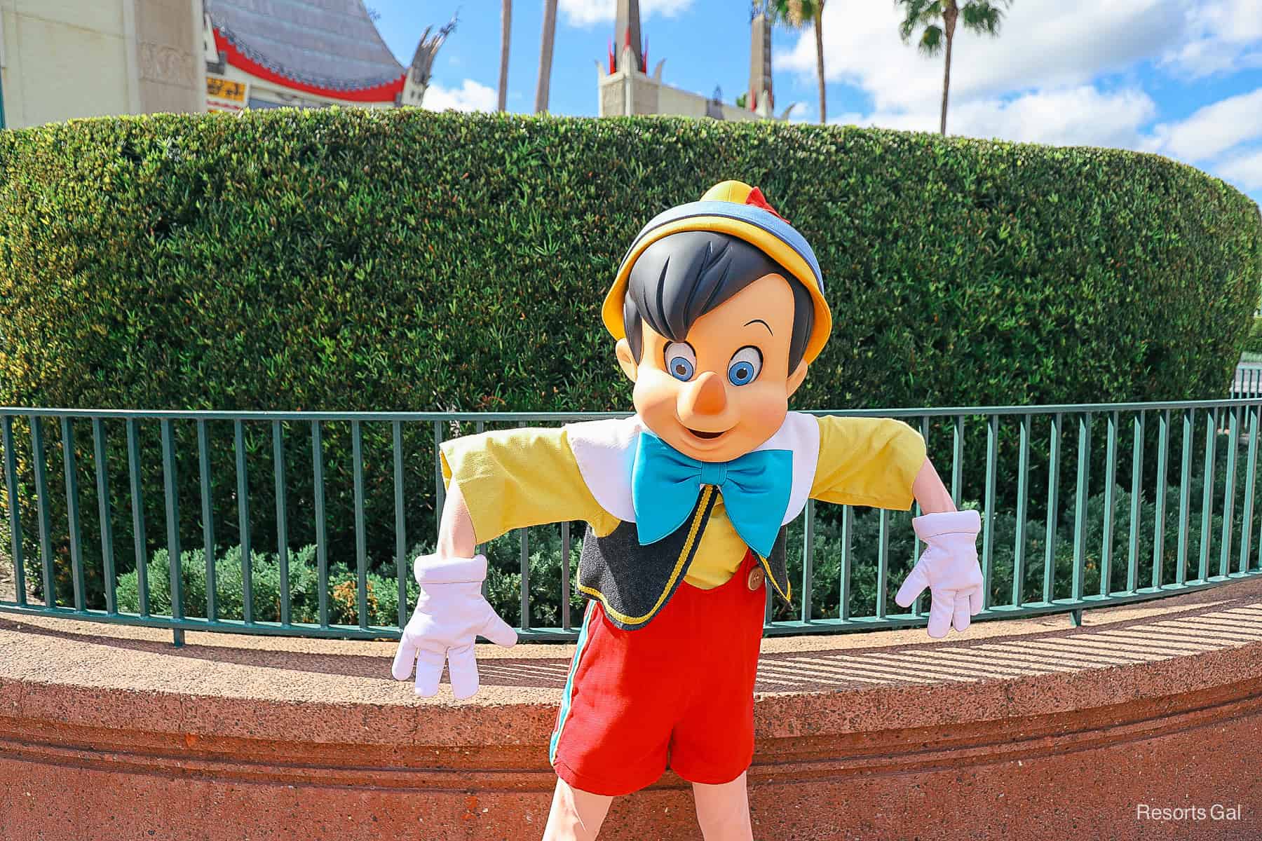 Pinocchio shows there are no strings on me photo pose