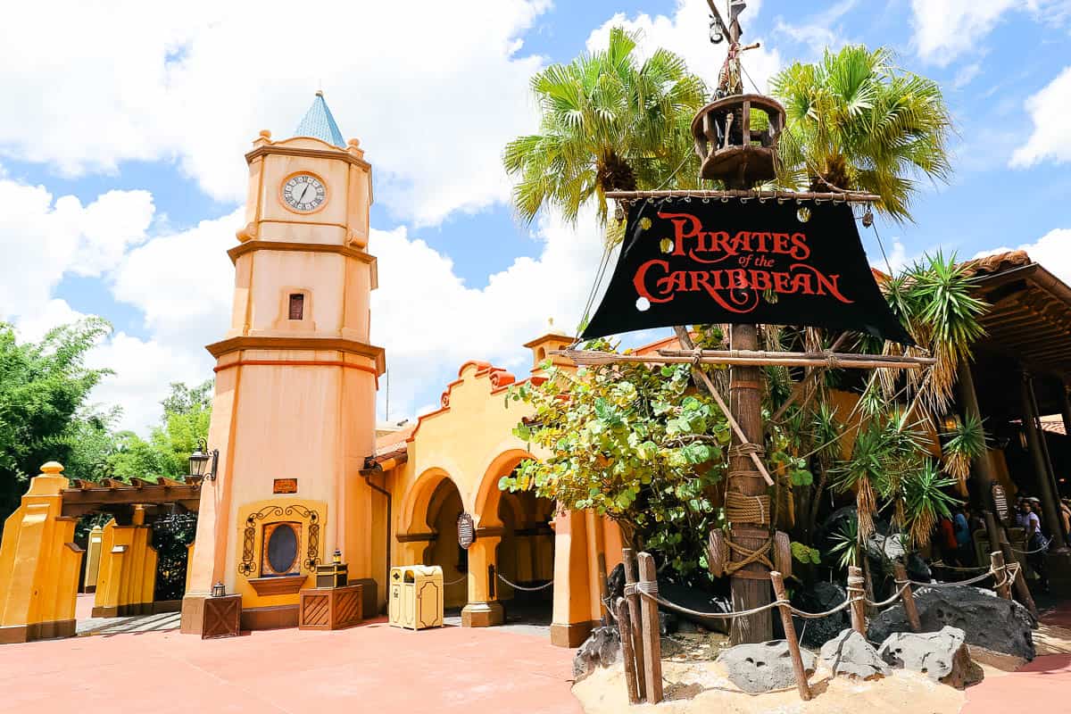 entrance to Pirates of the Caribbean with the attraction's signage 