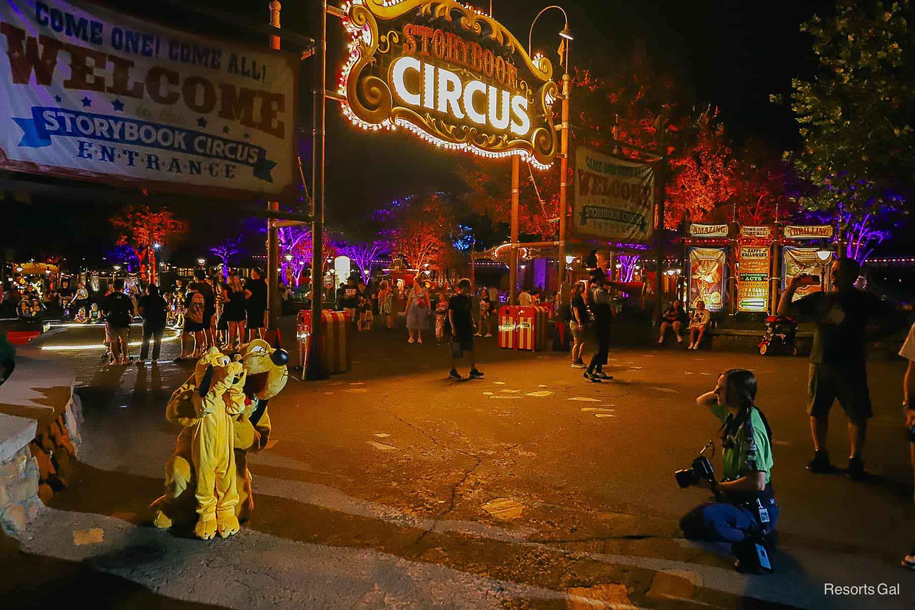 a guest dressed as Pluto having a photo made