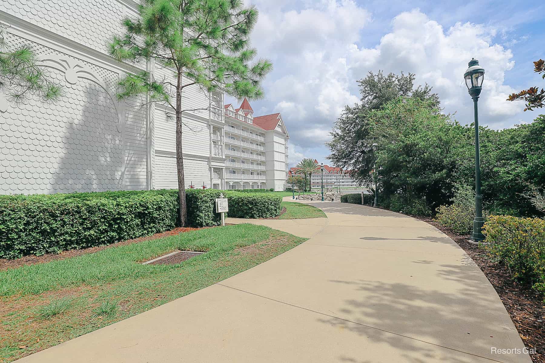 the walking path as you reach the Grand Floridian with white buildings and red roofs