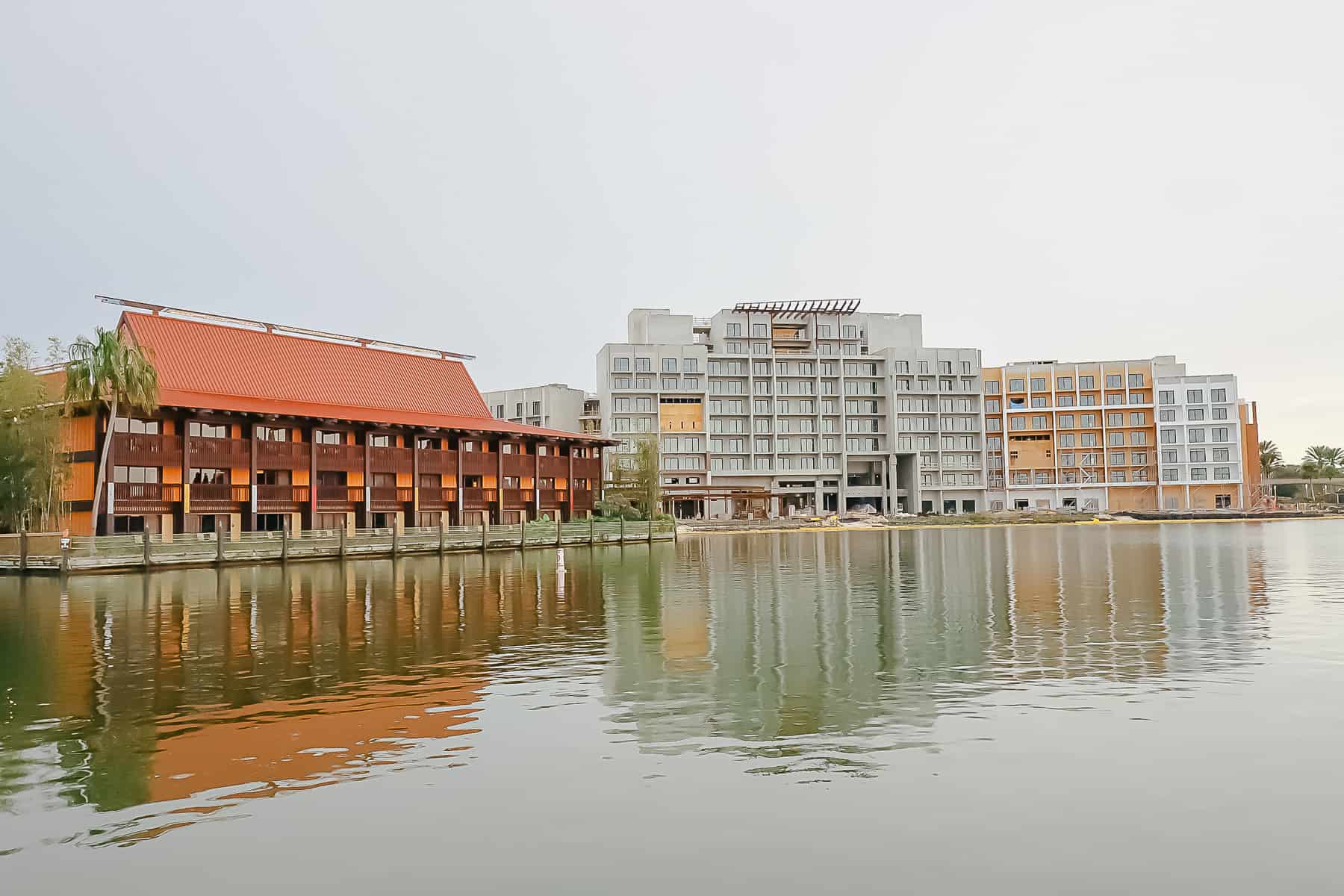 view of the Polynesian DVC Tower in January 2024 from boat dock 