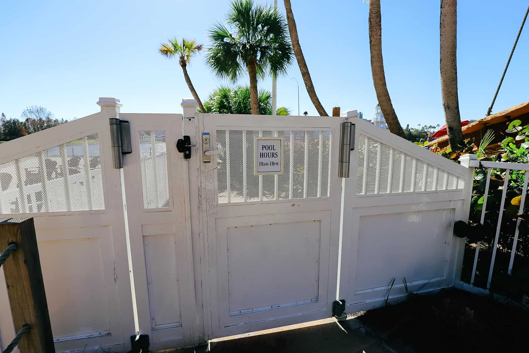 Pool hours posted at the feature pool at Disney's Beach and Yacht Club. 