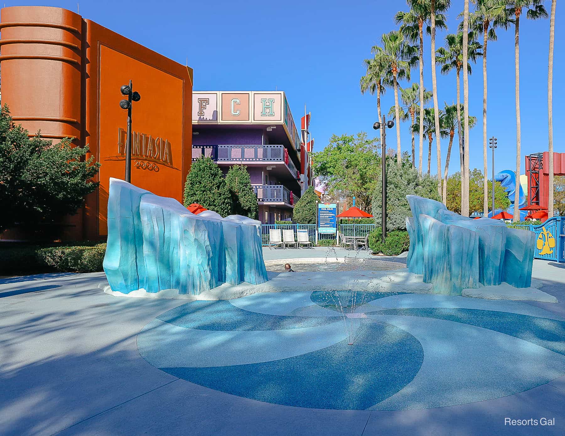 a small splash pad that's blue with a swirl design 