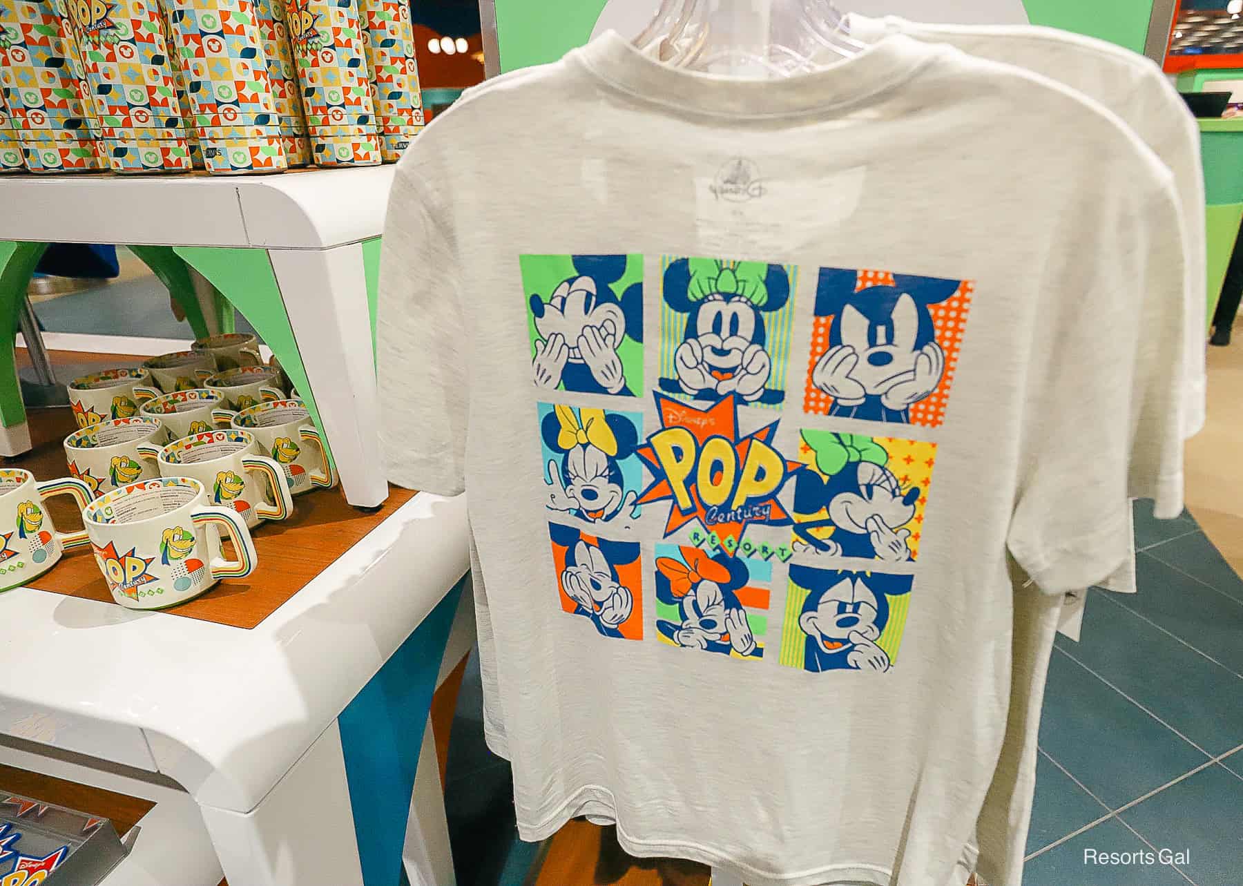 the back of the Pop Century logo t-shirt with Mickey and Minnie Mouse making silly faces