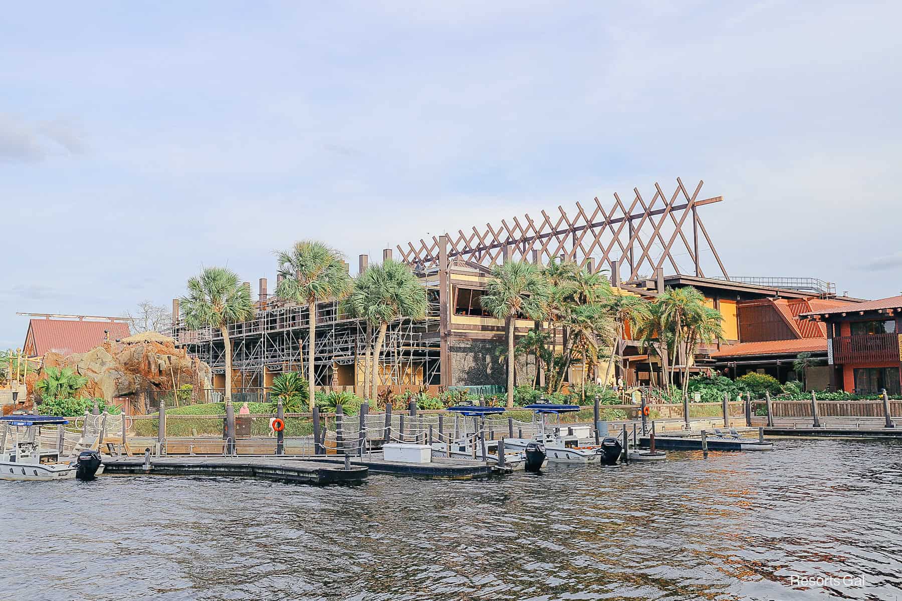 the Great Ceremonial House covered with scaffolding as seen from the resort's boat dock