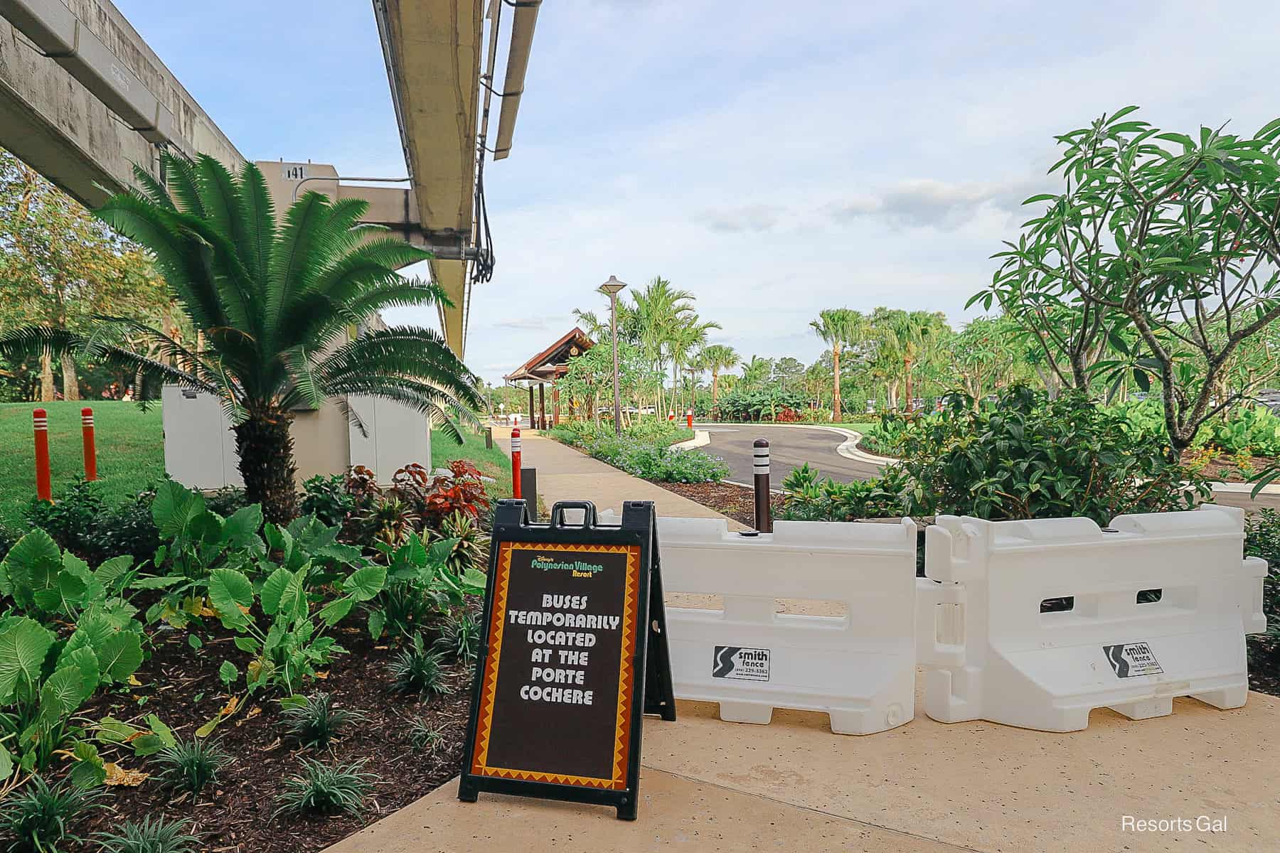a sign in front of the new bus stop at Disney's Polynesian Village Resort