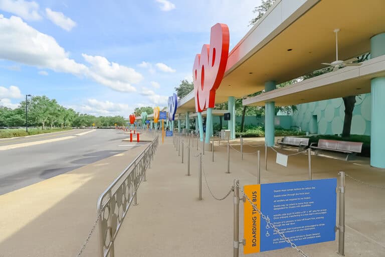 the resort bus stop at Disney's Pop Century Resort with wait queue