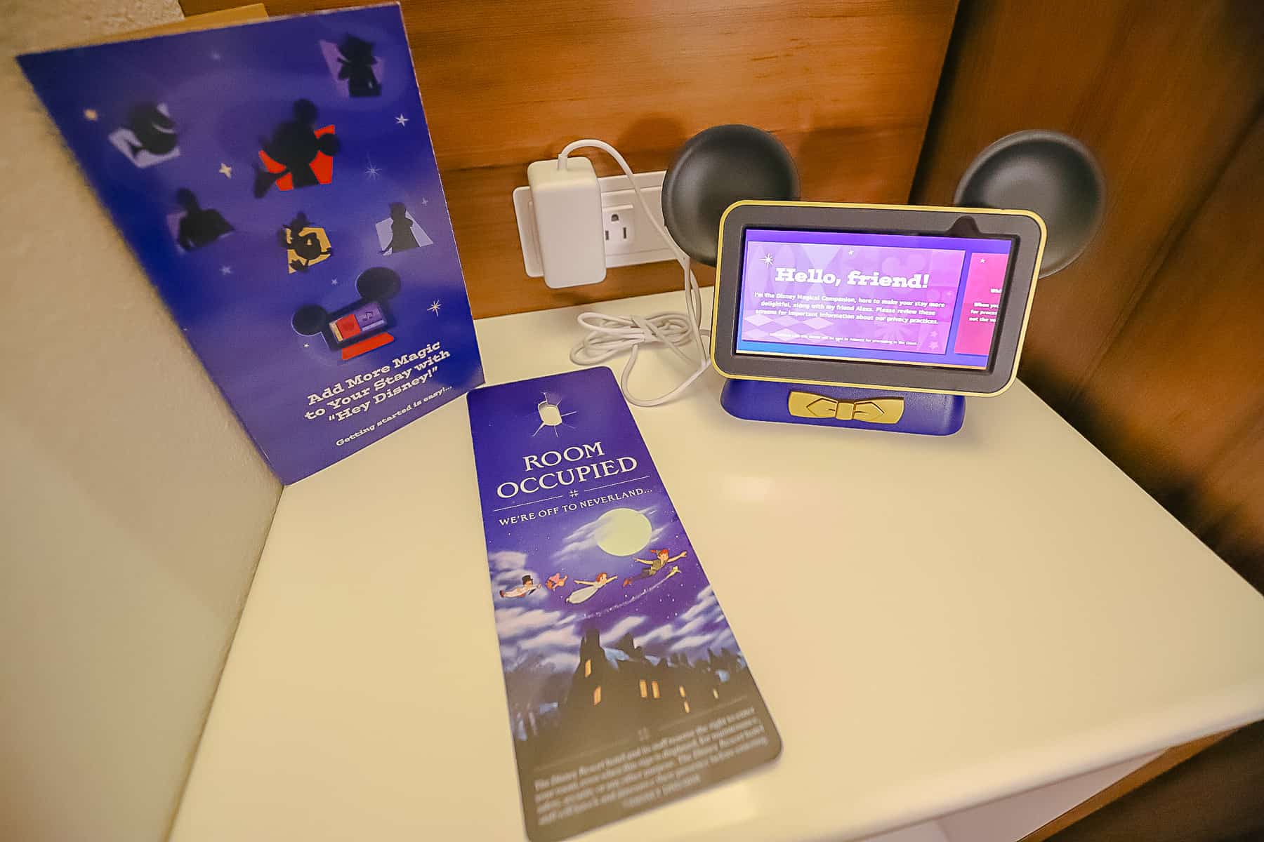 a nightstand with Hey Disney device 