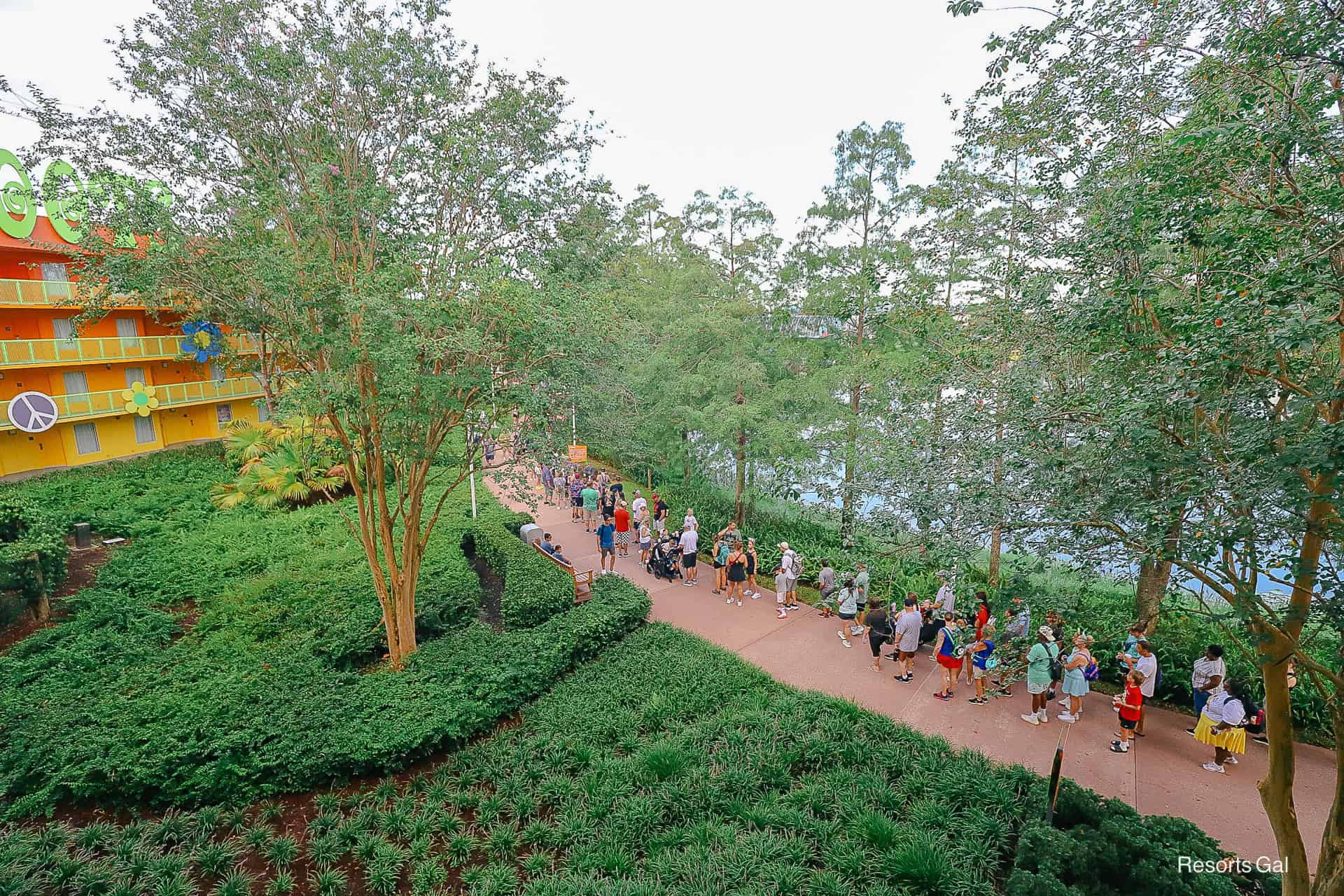 a section of guests waiting beyond building 4 for the Skyliner 