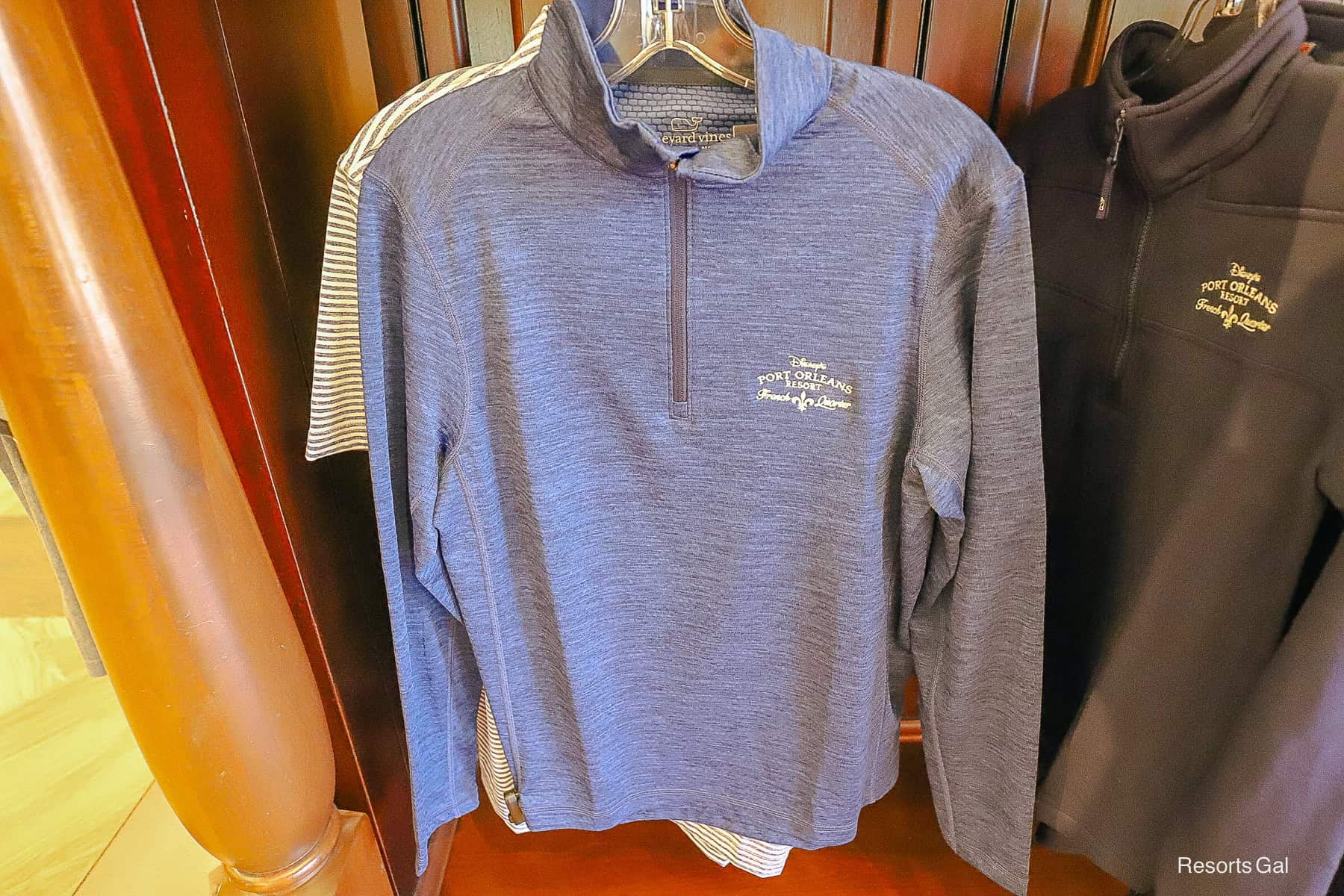 light weight navy pullover with the French Quarter logo