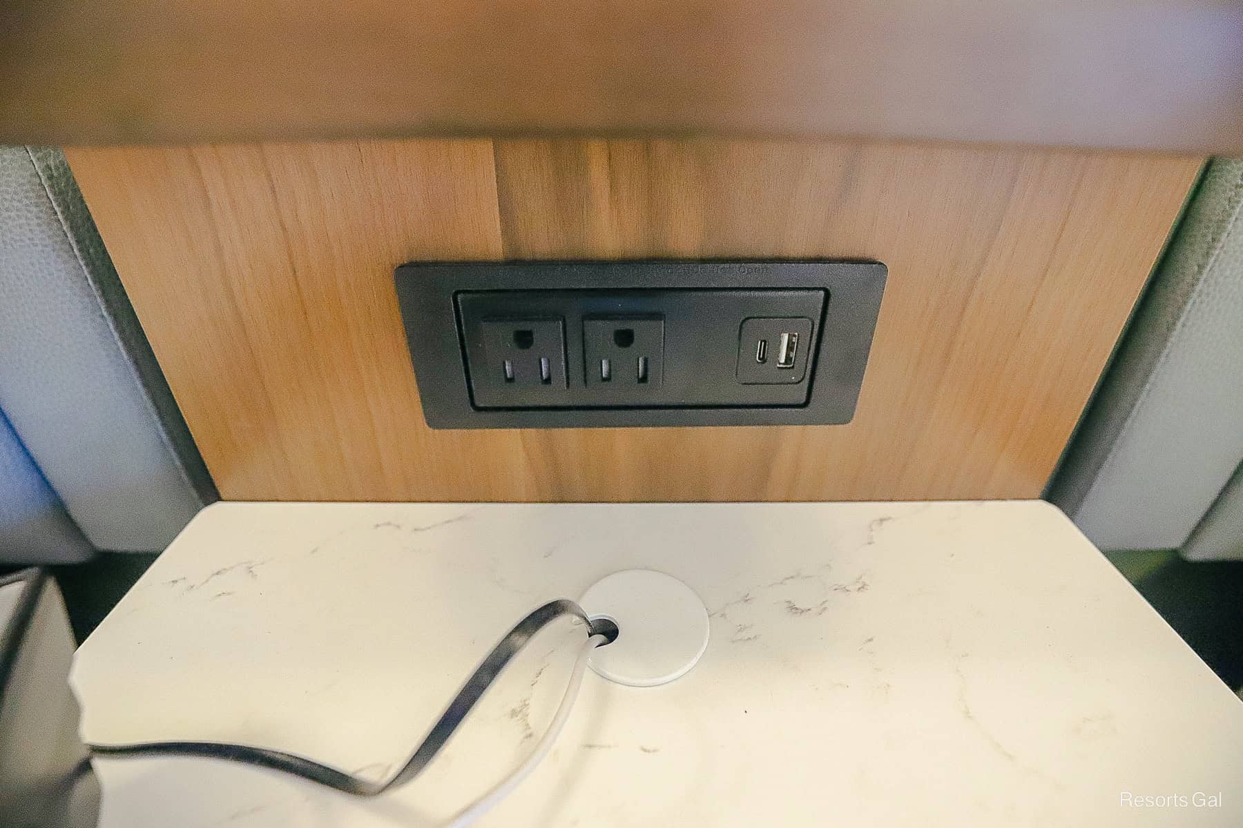 the outlets near the bed in a room at Port Orleans French Quarter