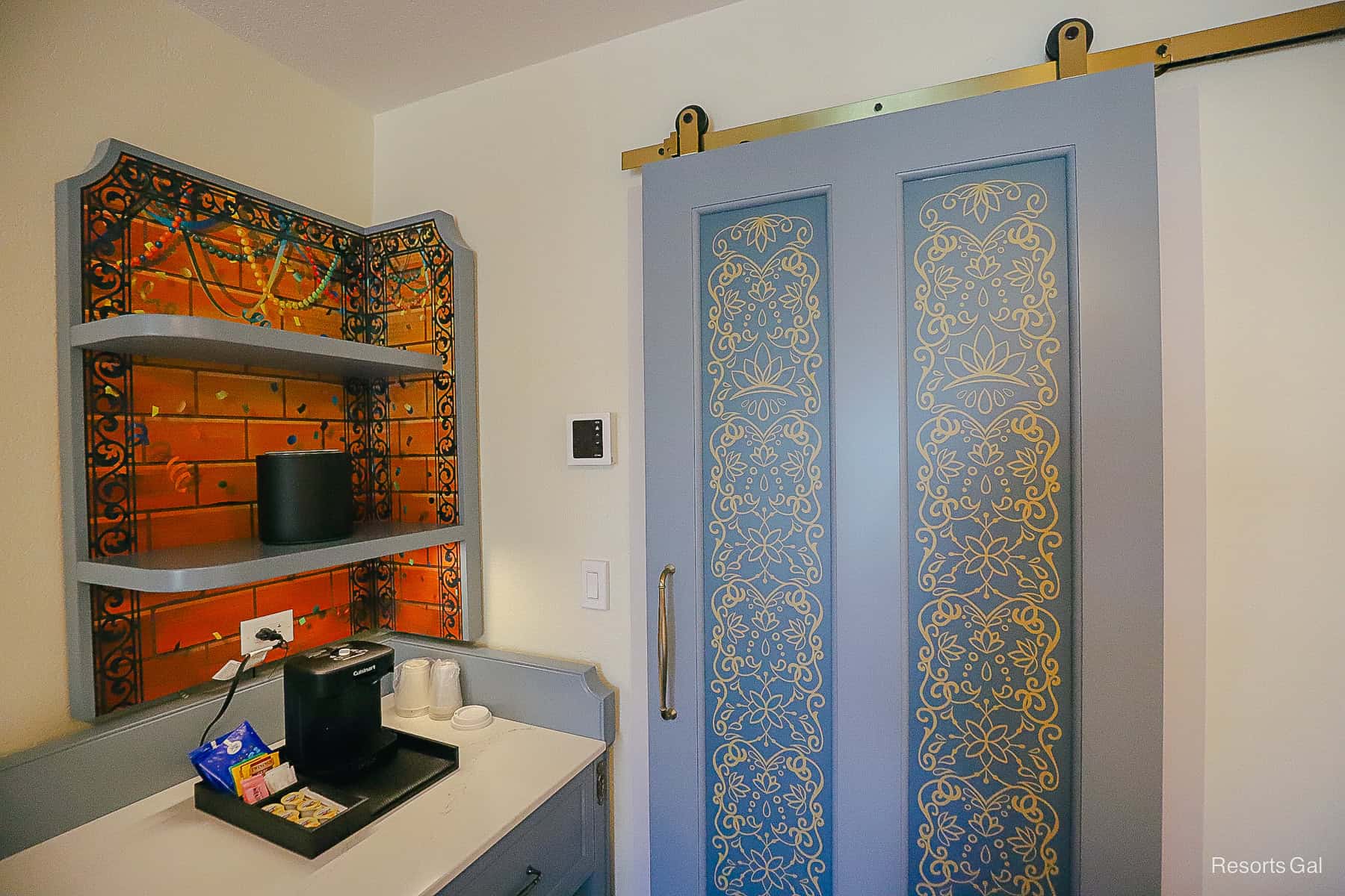 a sliding door separates the bath from the bed area