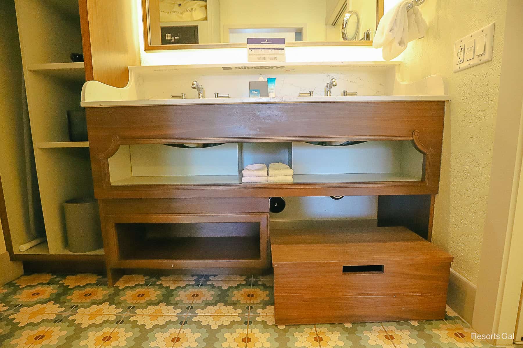 the step stool for children underneath the sink
