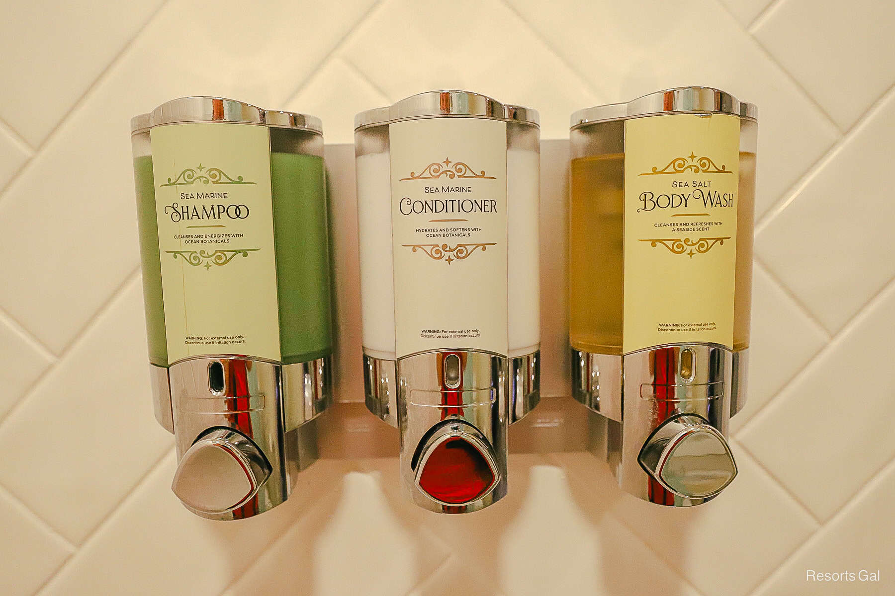 a built-in set of shampoo, conditioner, and body wash in the shower of the Port Orleans French Quarter Room