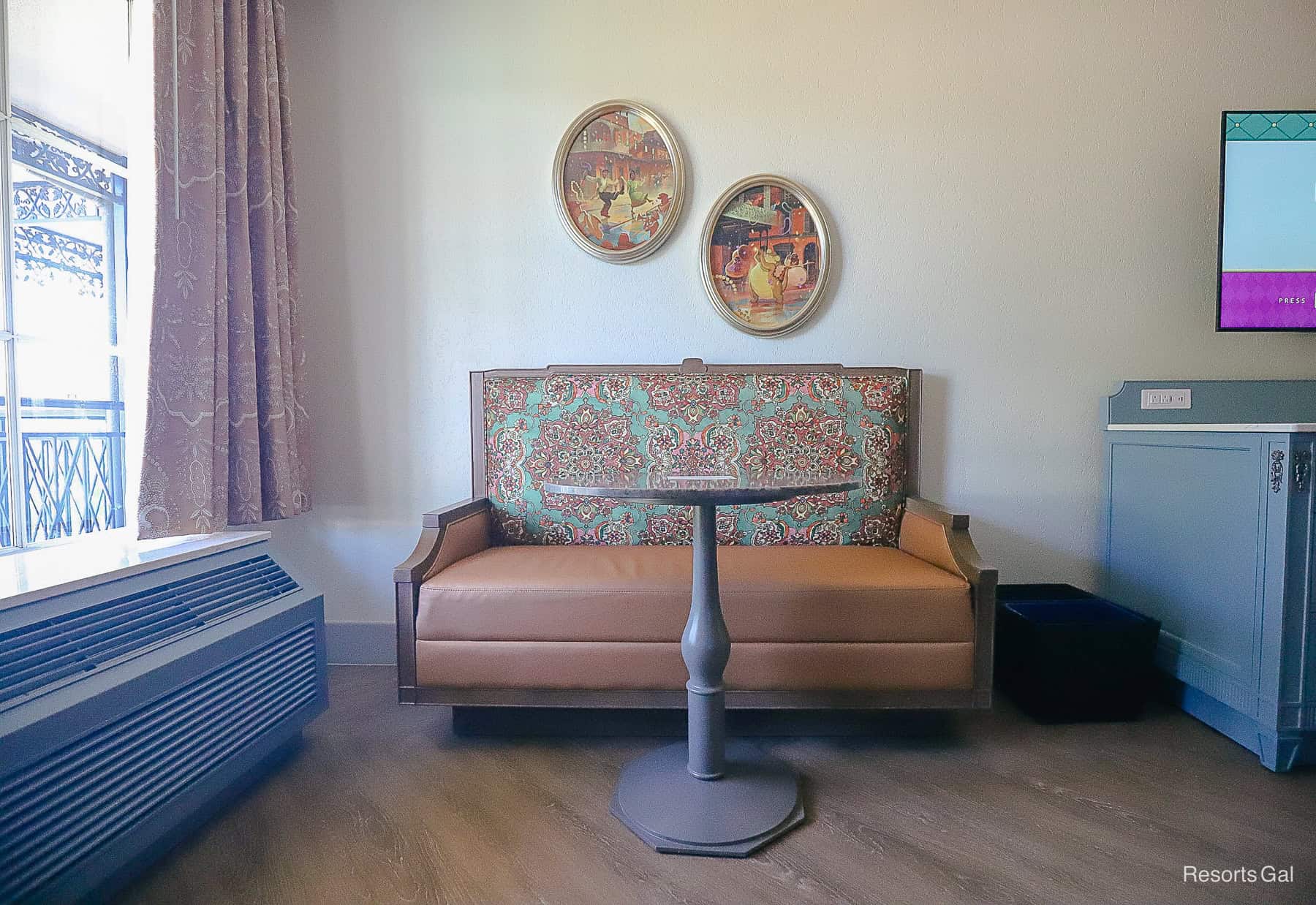 a front view of the table with sofa that shows the solid surface floors