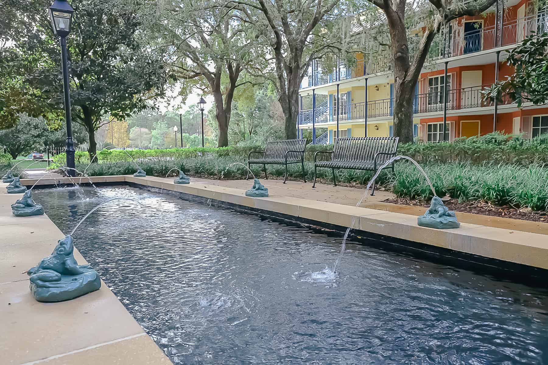 Fountains with frogs spitting water in the French Quarter at Disney World 