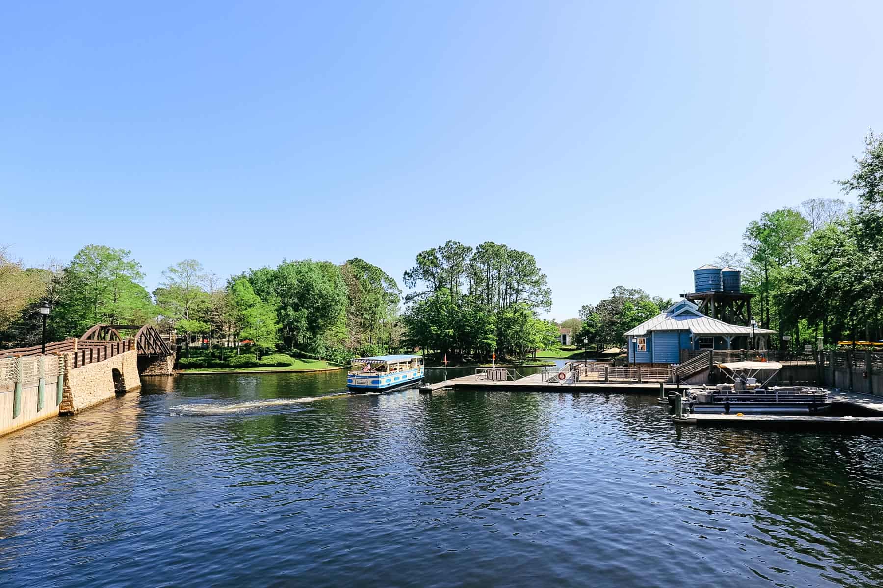 a water taxi is departing Port Orleans Riverside on the way to Port Orleans French Quarter