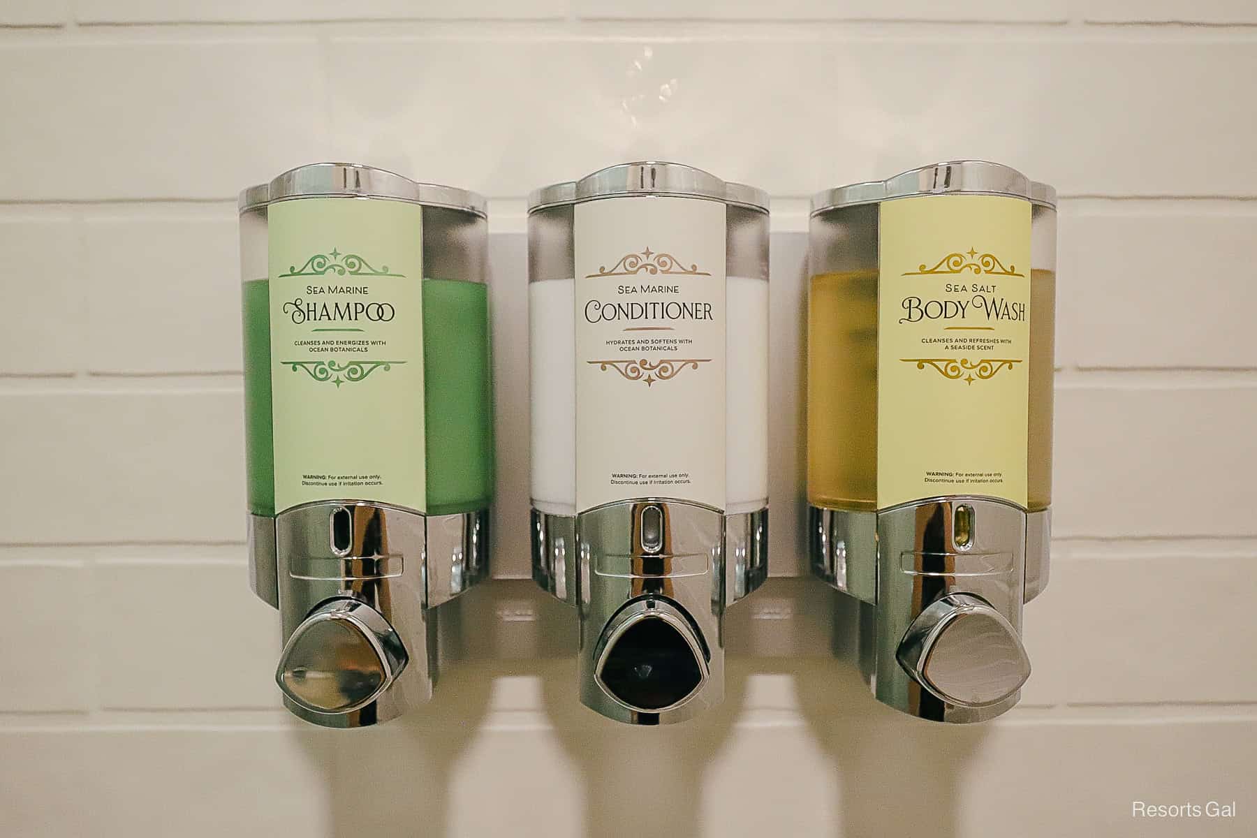 three built in shower dispensers that include shampoo, conditioner, and body wash
