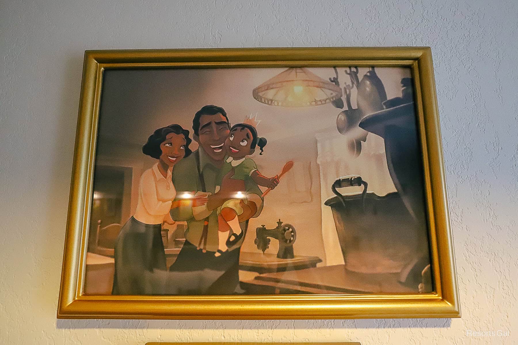 a family portrait of Tiana with her mom and dad
