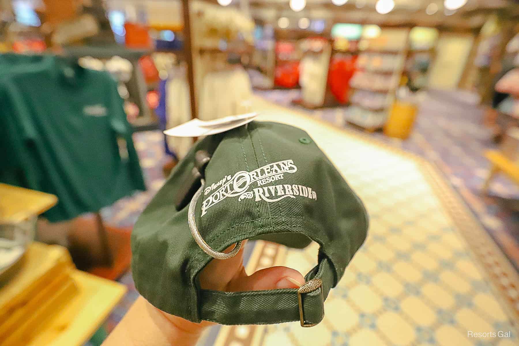 back of the green cap with white logo