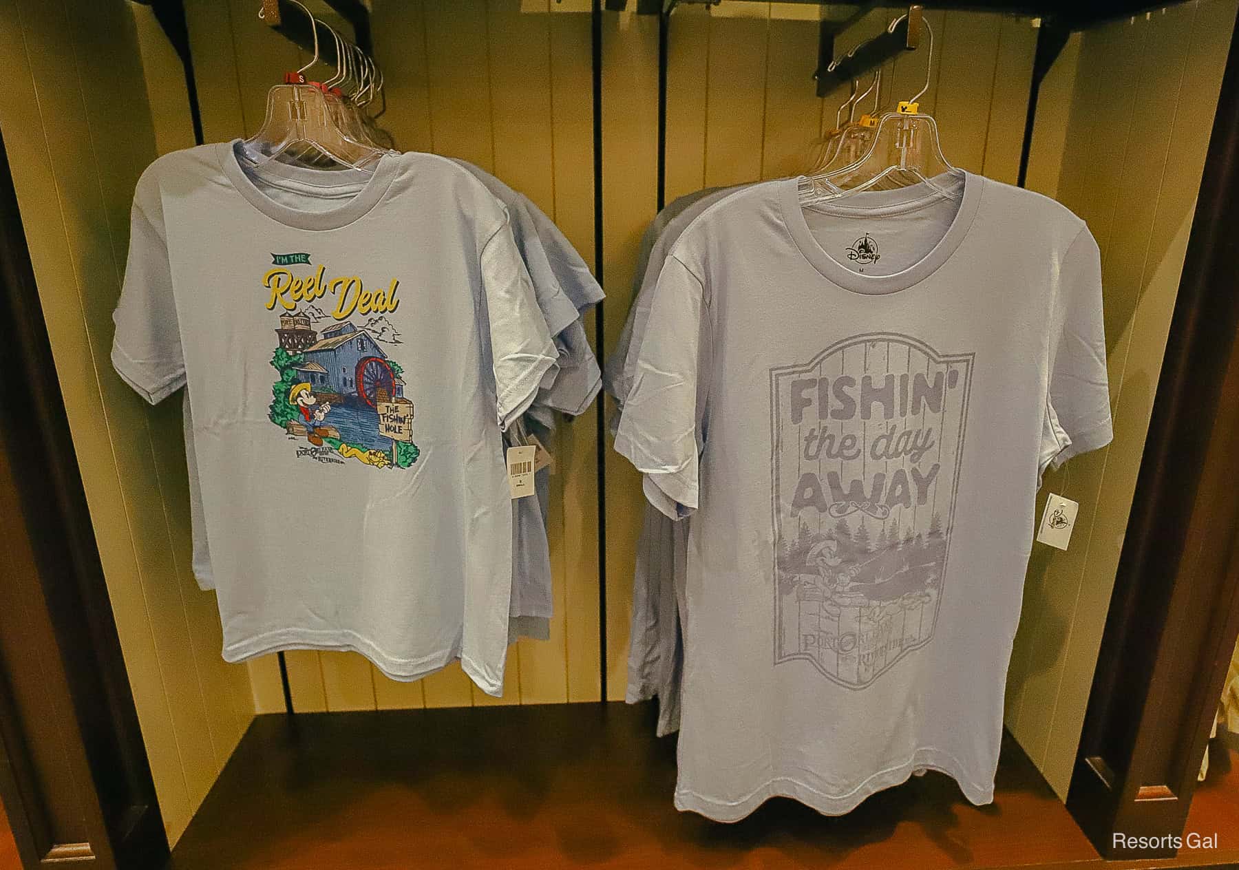 a child's t-shirt and an adult's shirt with fishing at the resort