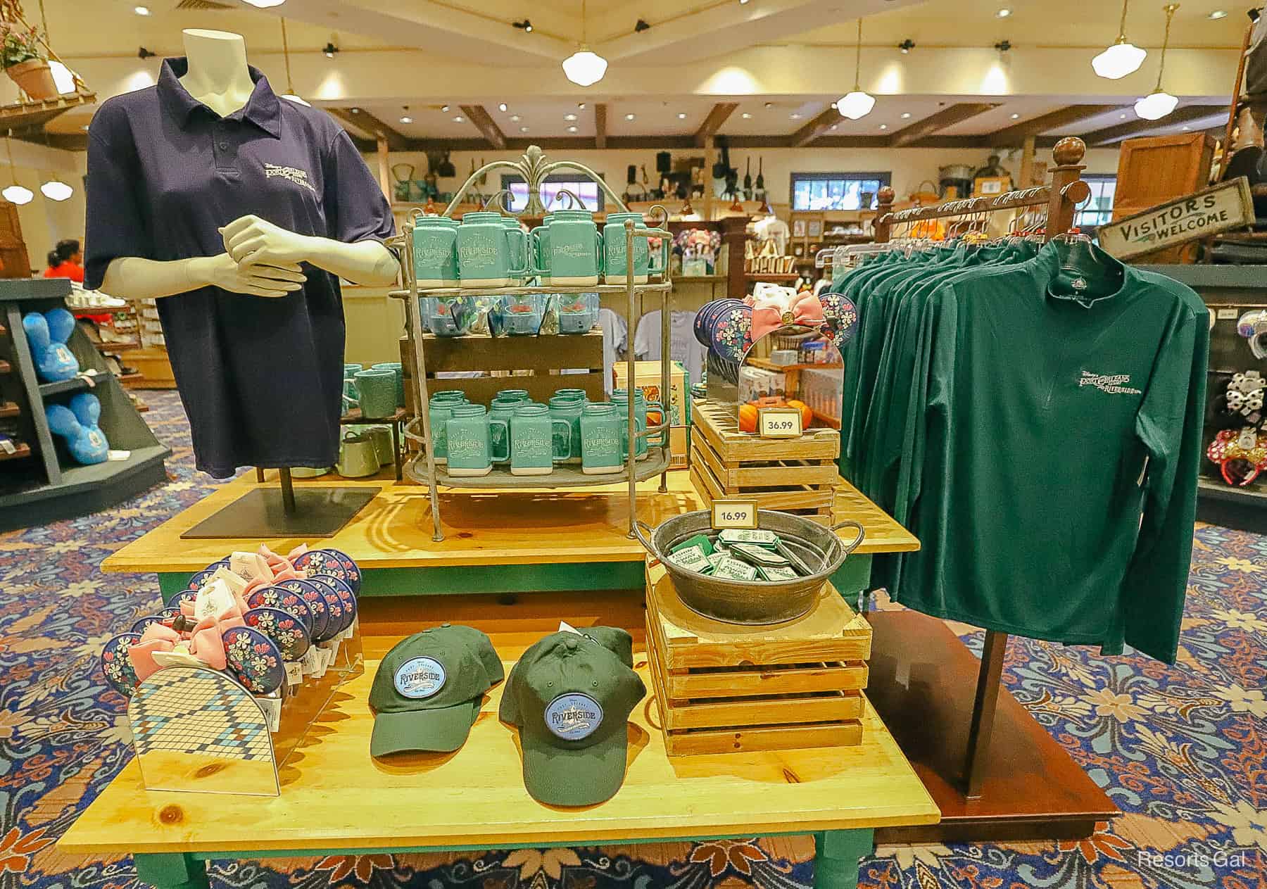 a display featuring green and navy resort merchandise at Disney's Port Orleans Riverside /