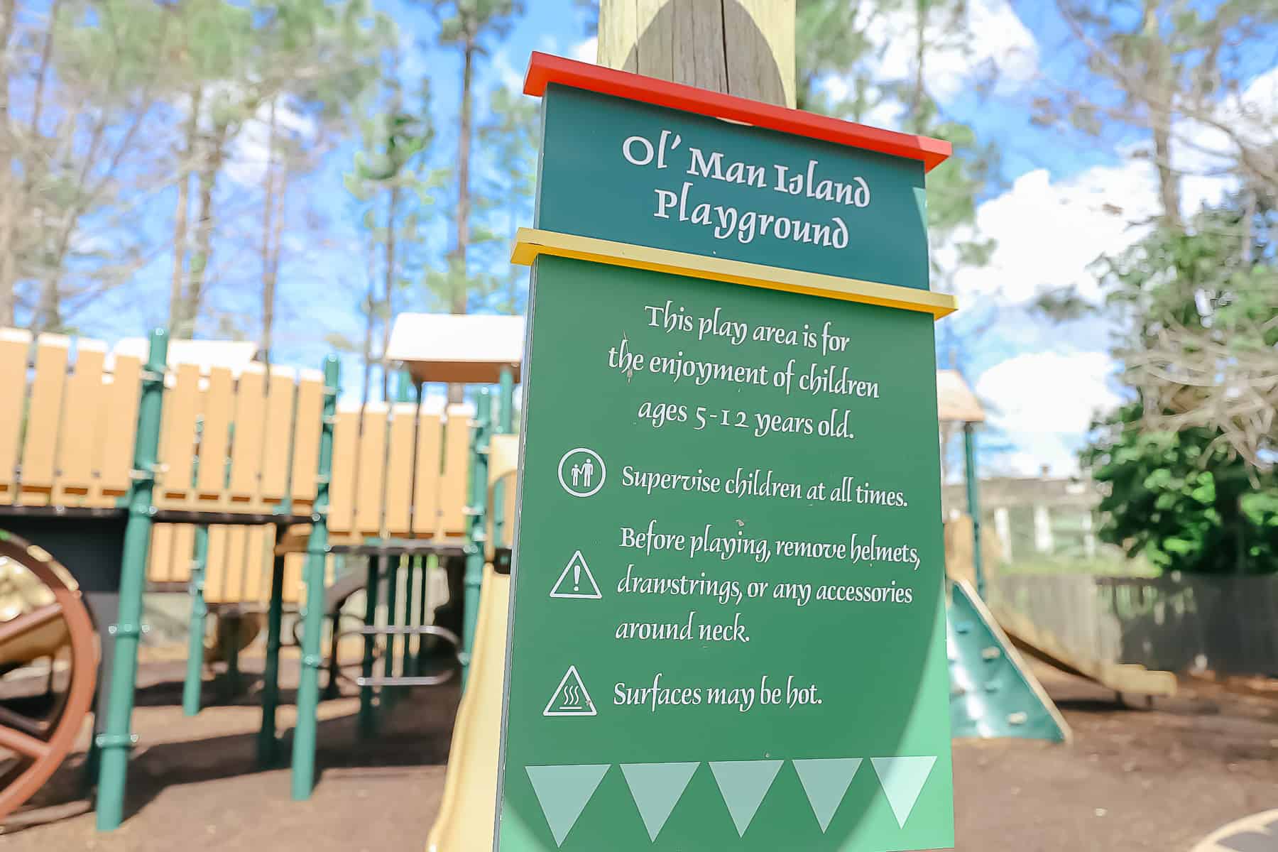 a sign that says the playground at Port Orleans Riverside is for children ages 5-12 years old 