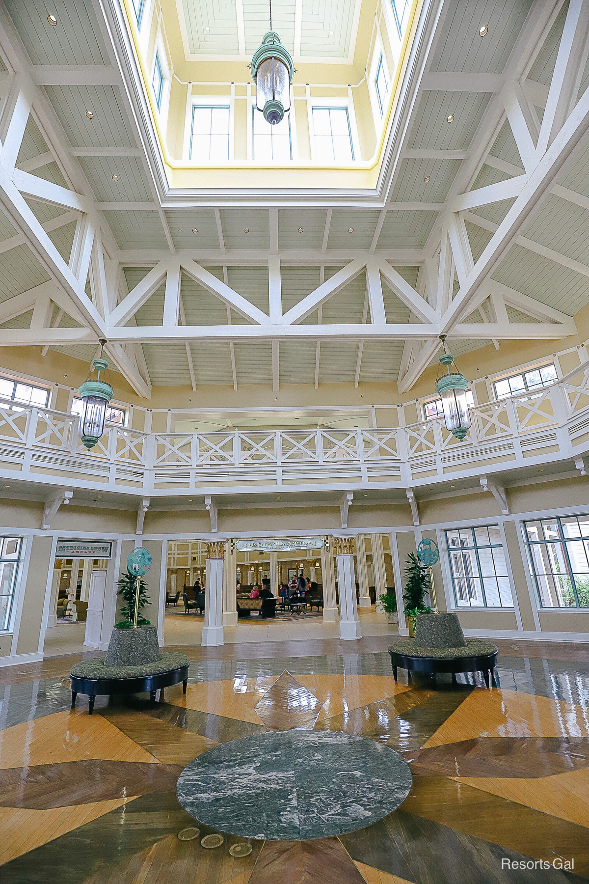 the light shining down into the lobby of Port Orleans Riverside 