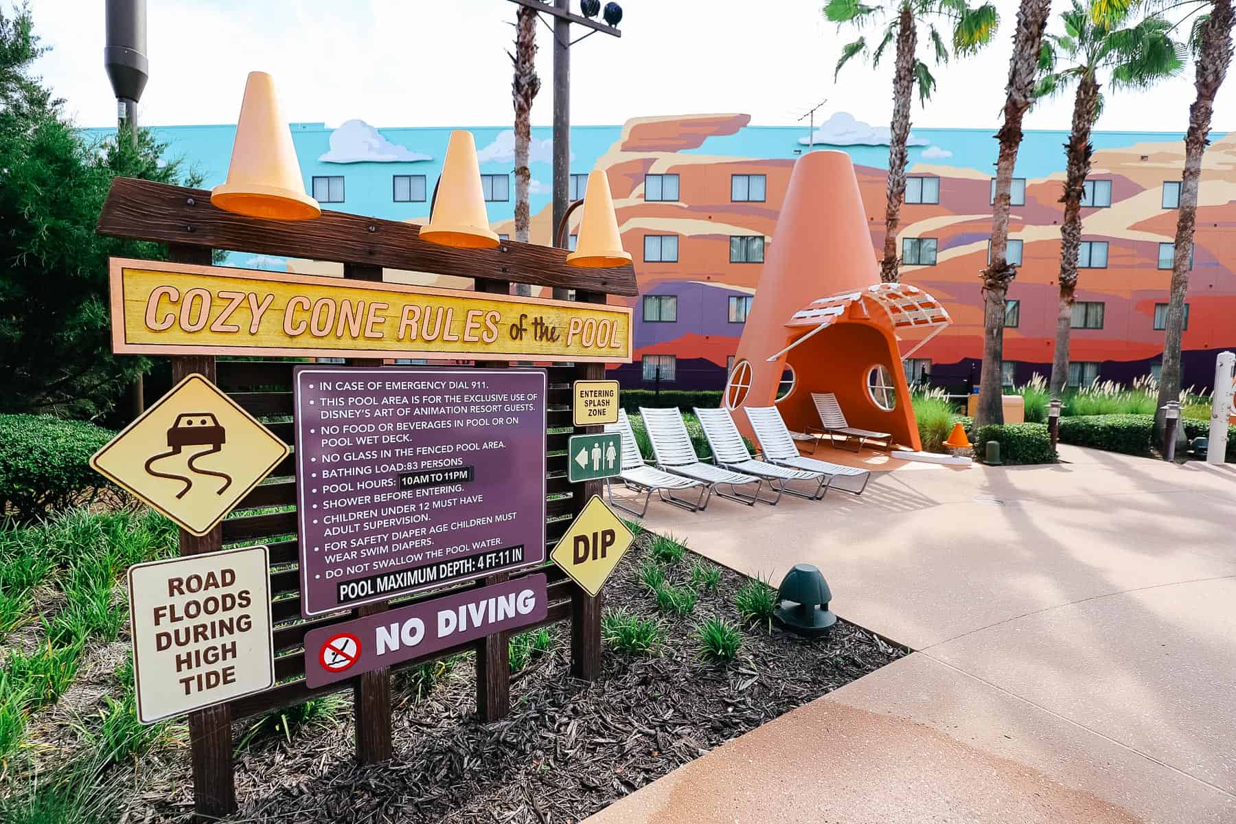 A posted sign that shares the pool rules at Art of Animation's Cozy Cone Pool. 