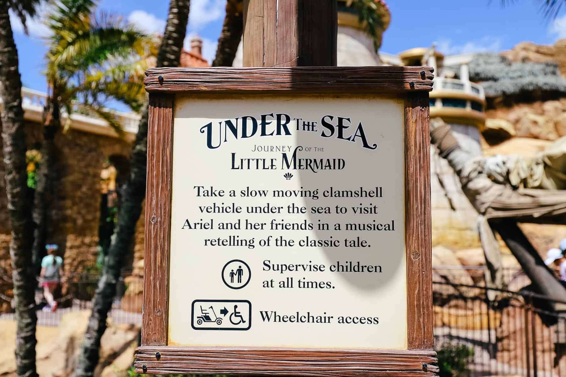 Ride rules for Under the Sea Journey of the Little Mermaid says, "Take a slow moving clamshell under the sea to visit Ariel and her friends in a musical retelling of the classic tale." 