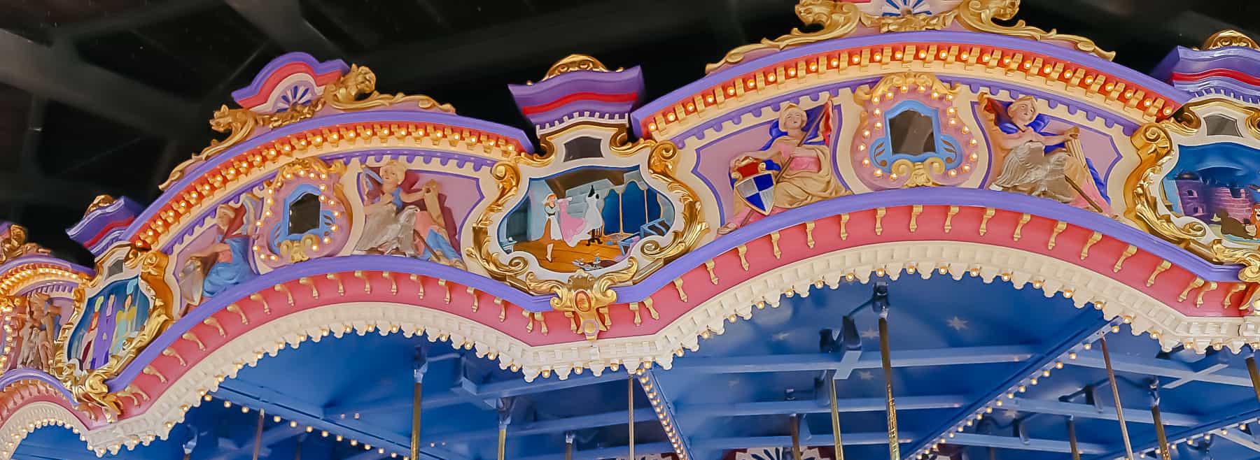 painted panels tell the story of Cinderella on Prince Charming Regal Carrousel