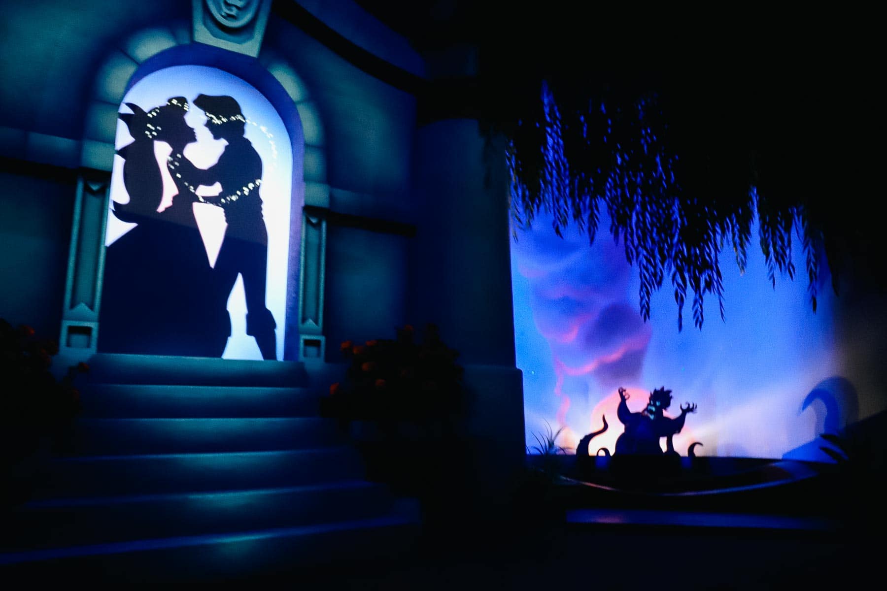Ariel and Prince Eric are united while Ursula screams in the background. 