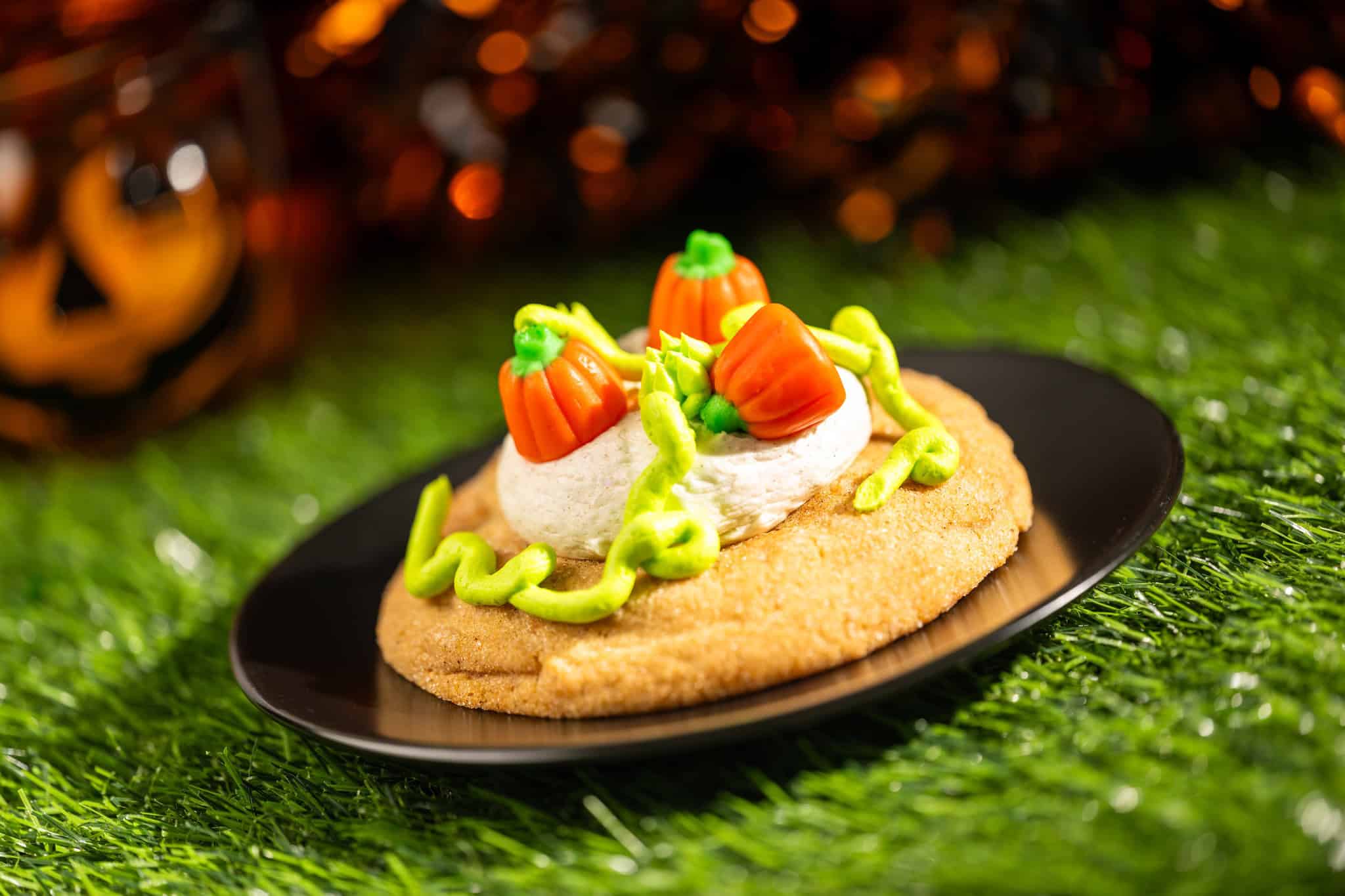 a snickerdoodle cookie that's topped with candy pumpkins