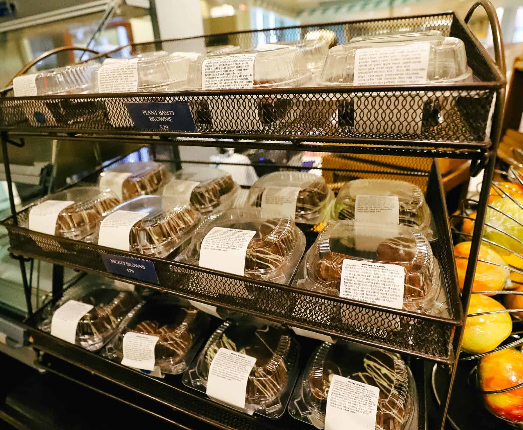 A rack of brownies toward the back of the quick service.